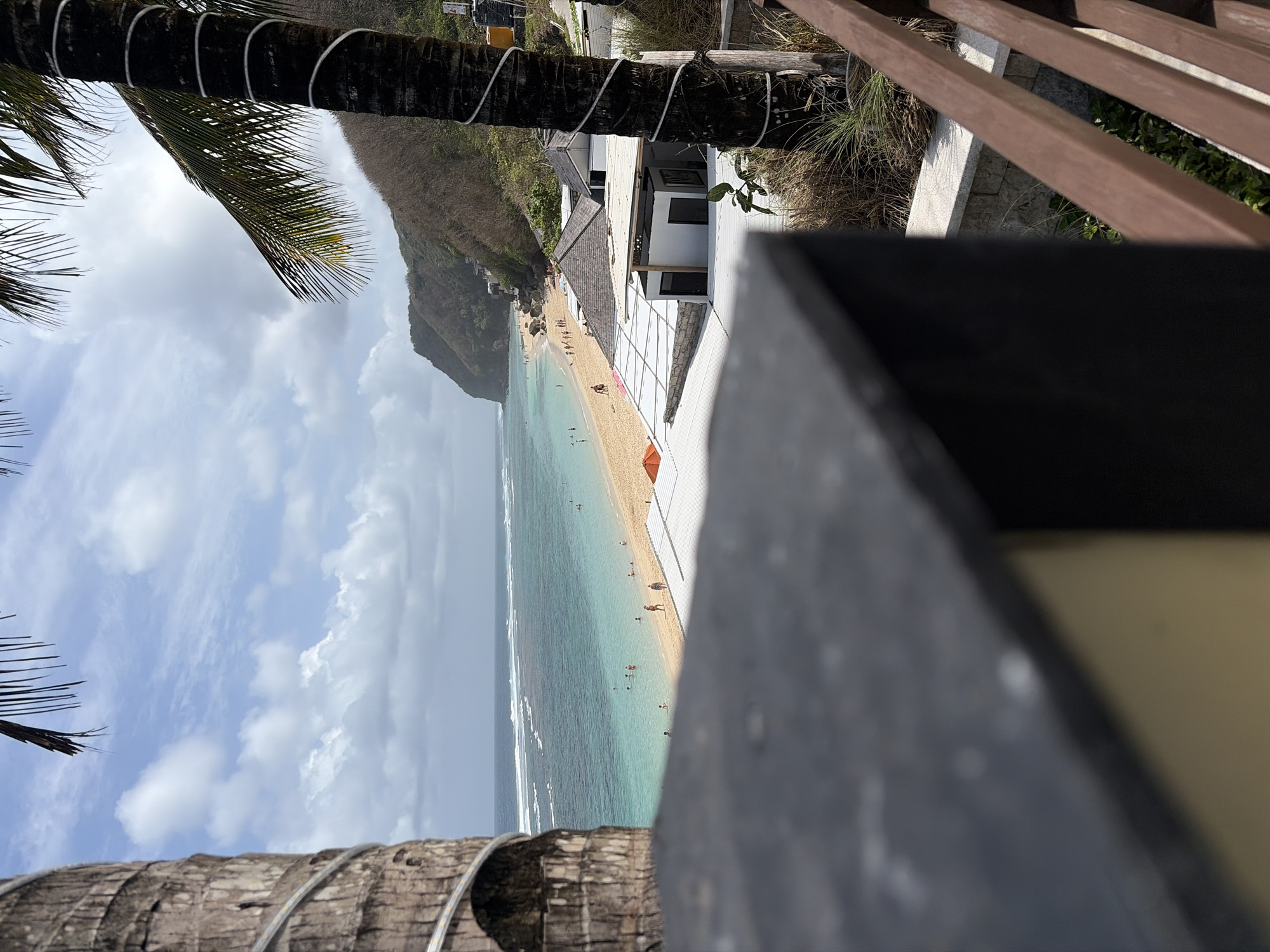 Poolside and shoreline at a Kuta Selatan beach resort