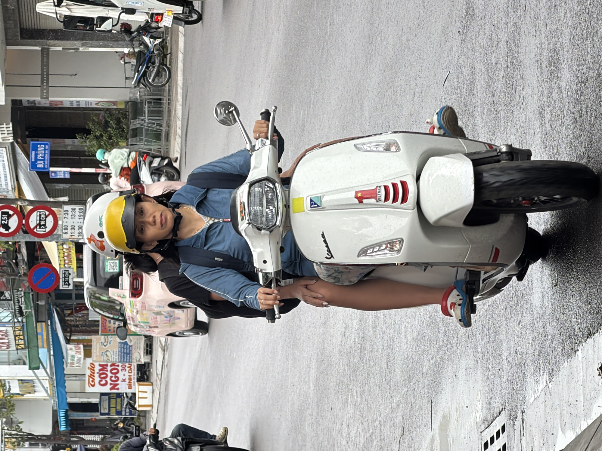 Rainy morning commute through Nha Trang's wet city streets