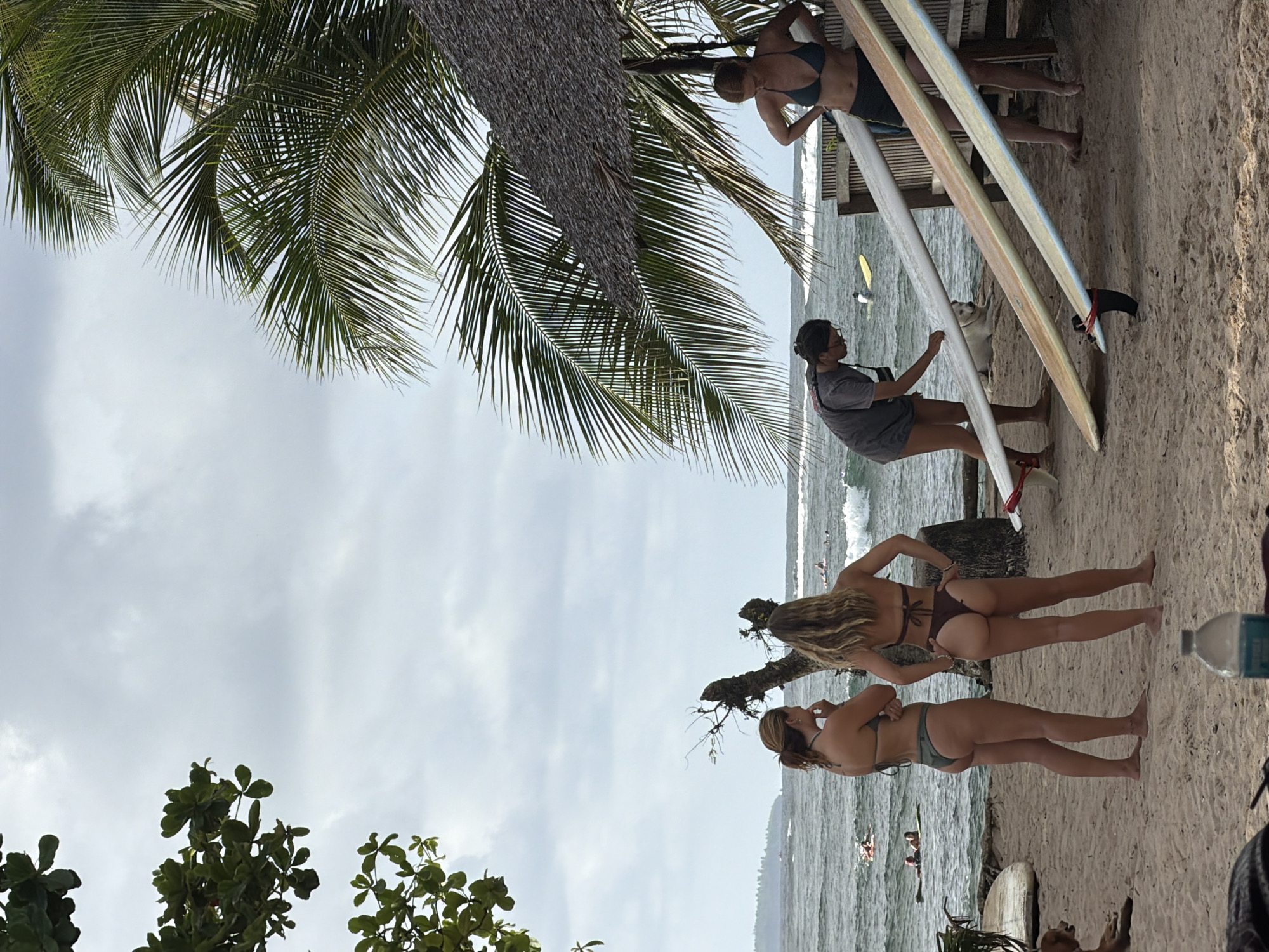 Two women spotted on General Luna beach under cloudy skies