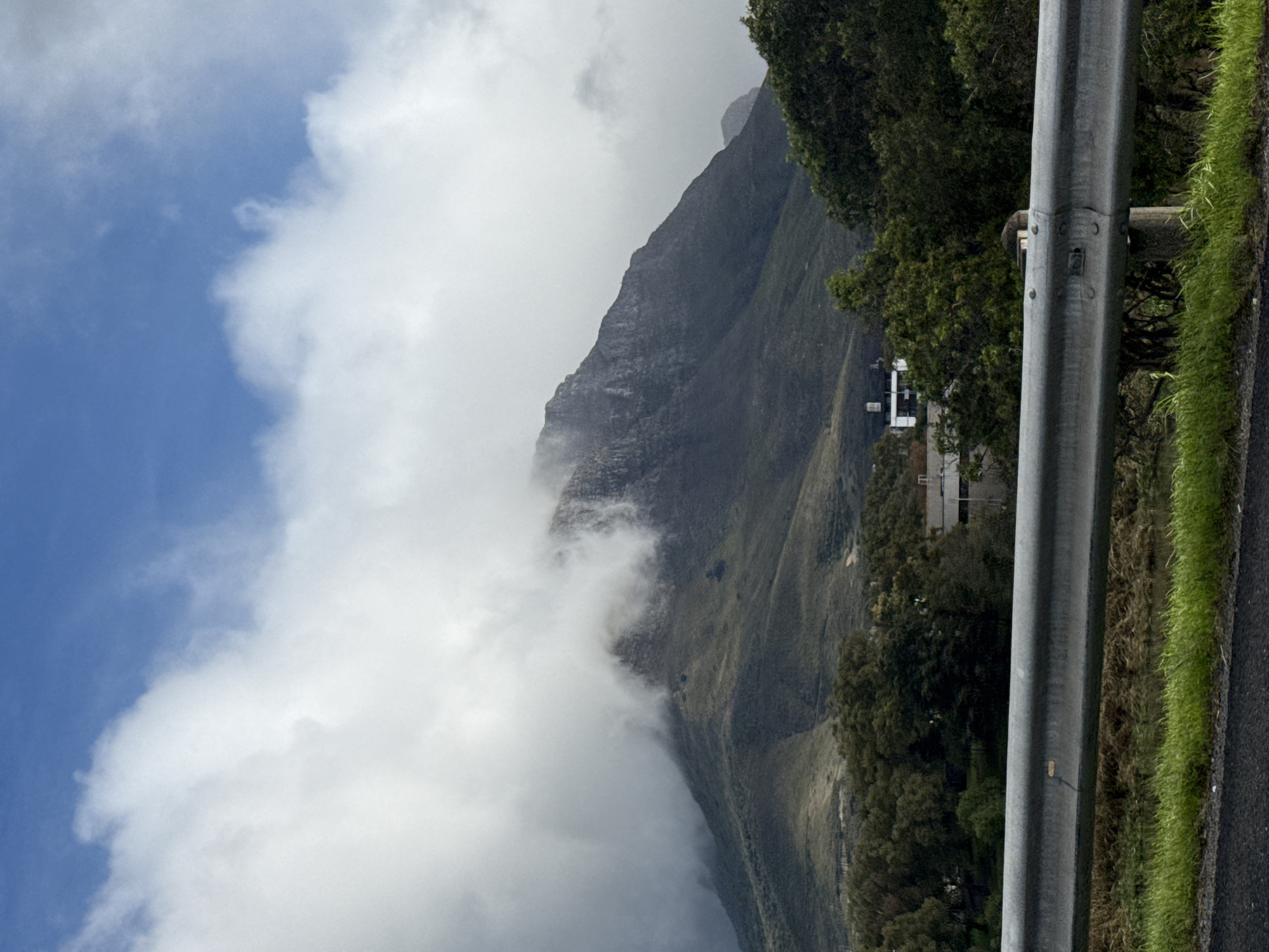 Table Mountain partially clouded over in Cape Town afternoon