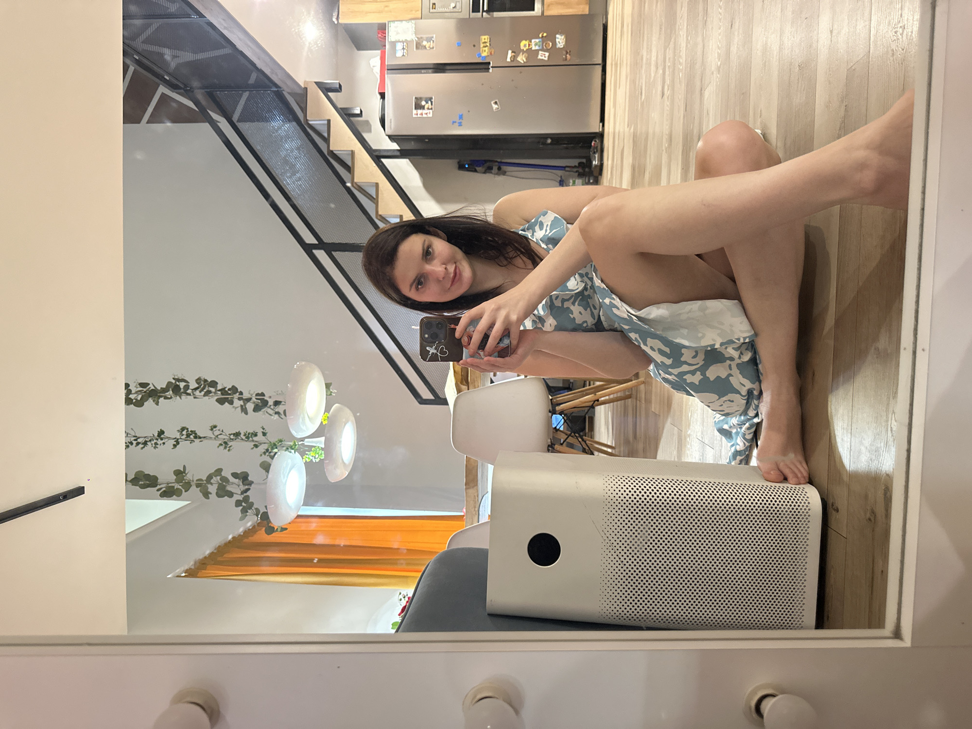 Selfie session in a sunny room, plus a toy vehicle flat lay