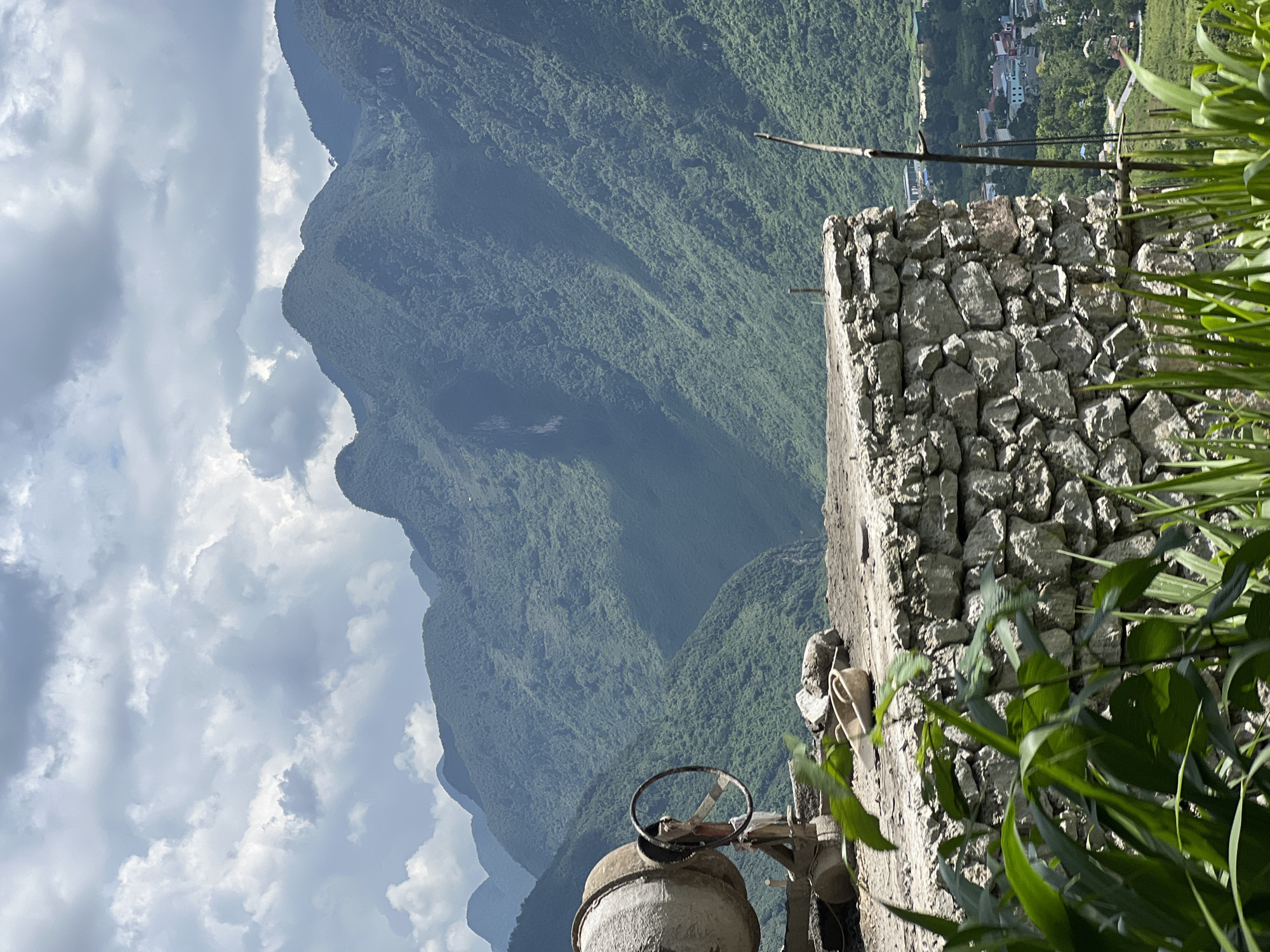 Road, construction, and fuel stops through Lùng Tám's mountain terrain