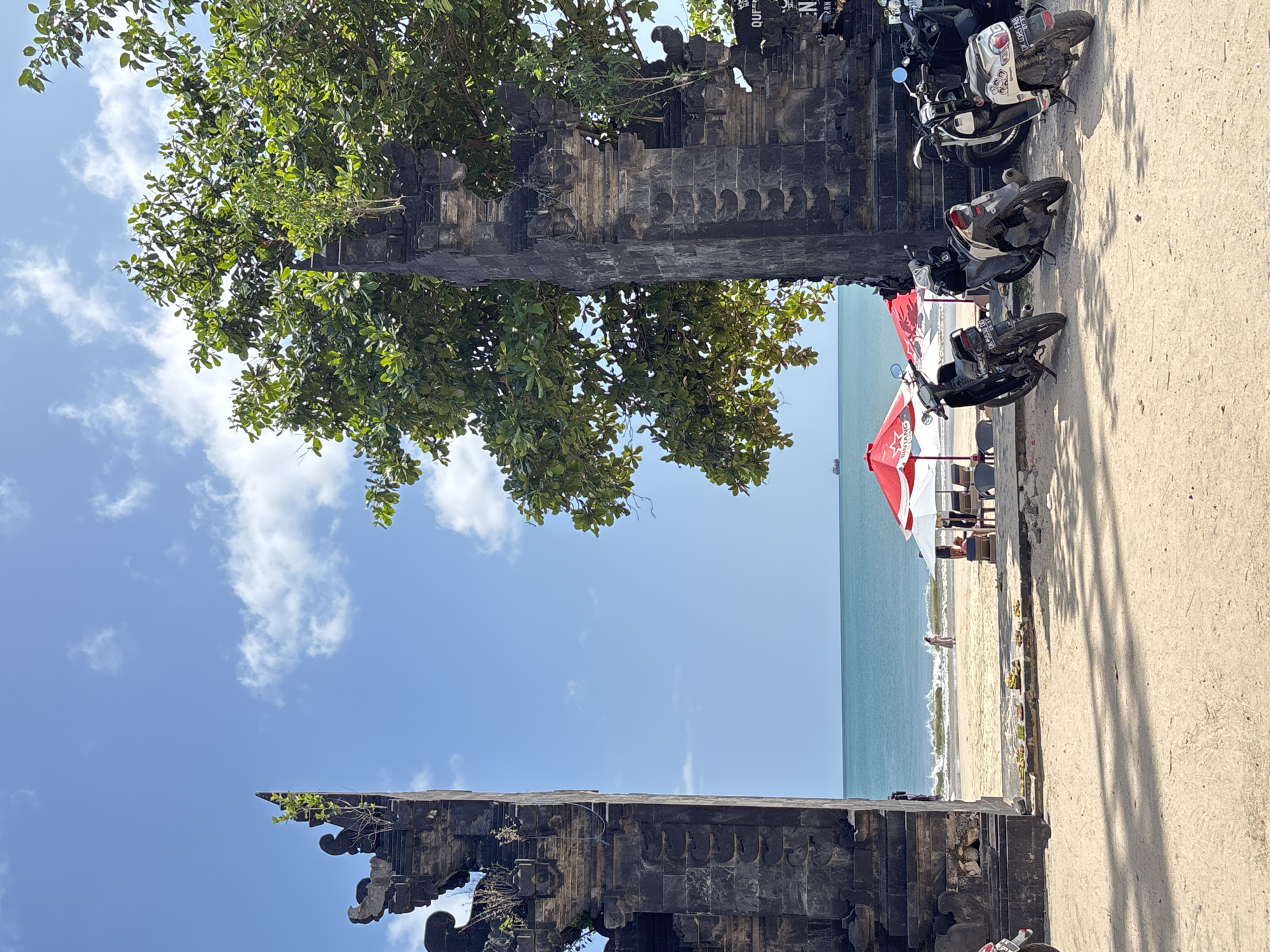 Early morning scenes captured across Kuta beaches, traditional Balinese presence