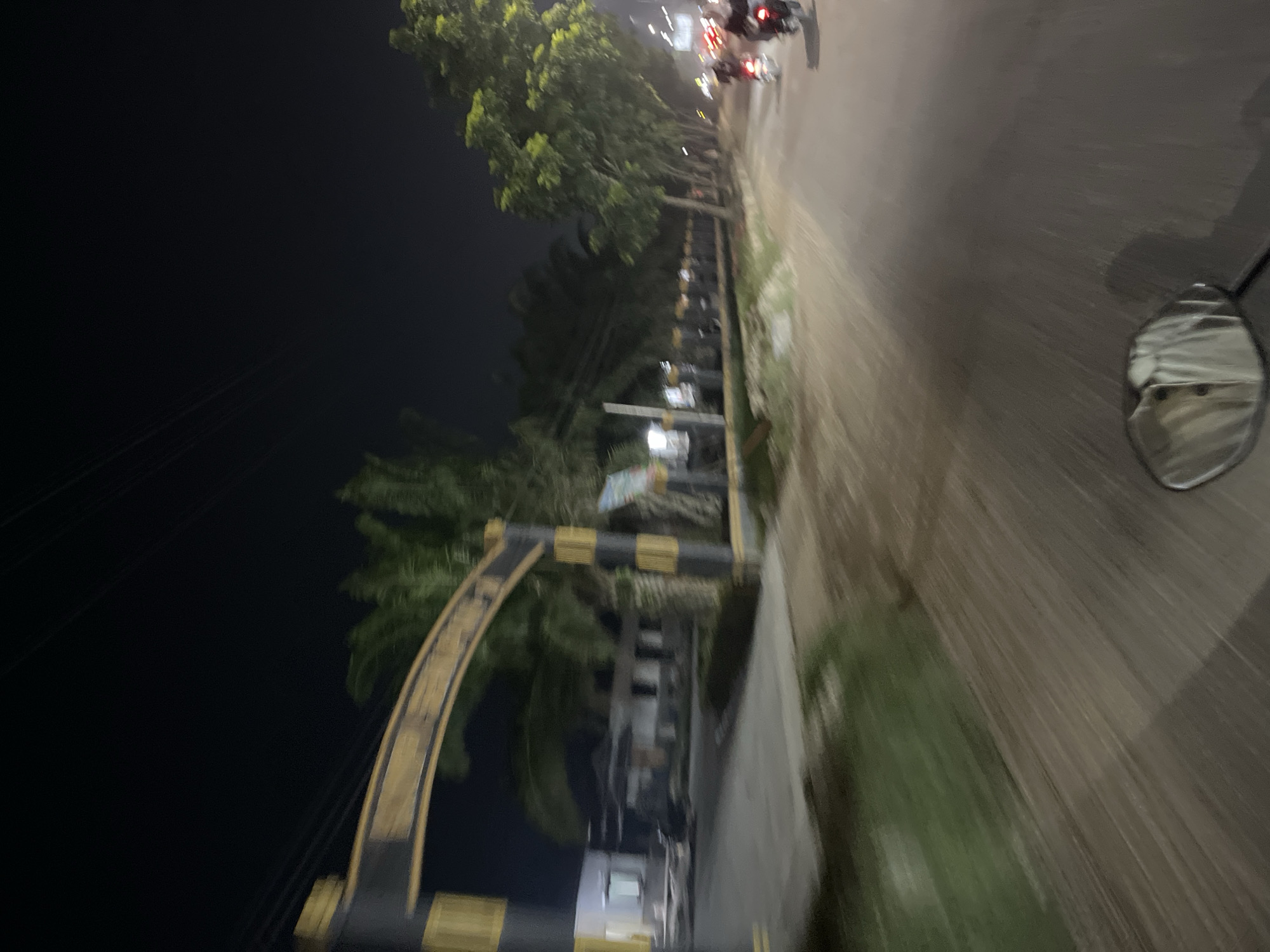 Nighttime ride through Bundar's streets, mosques, and food stalls