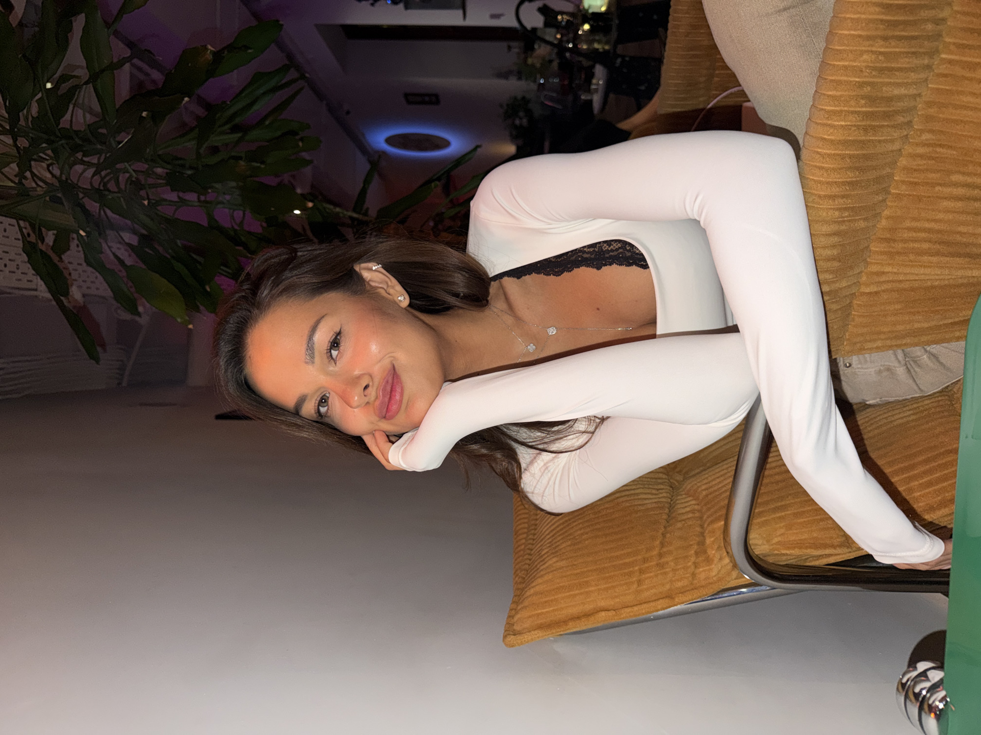 Woman photographed in multiple poses at Moscow venue