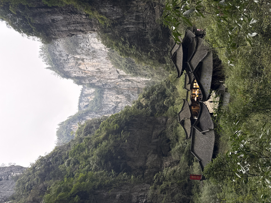 Tourist documents Three Natural Bridges karst formations in Wulong