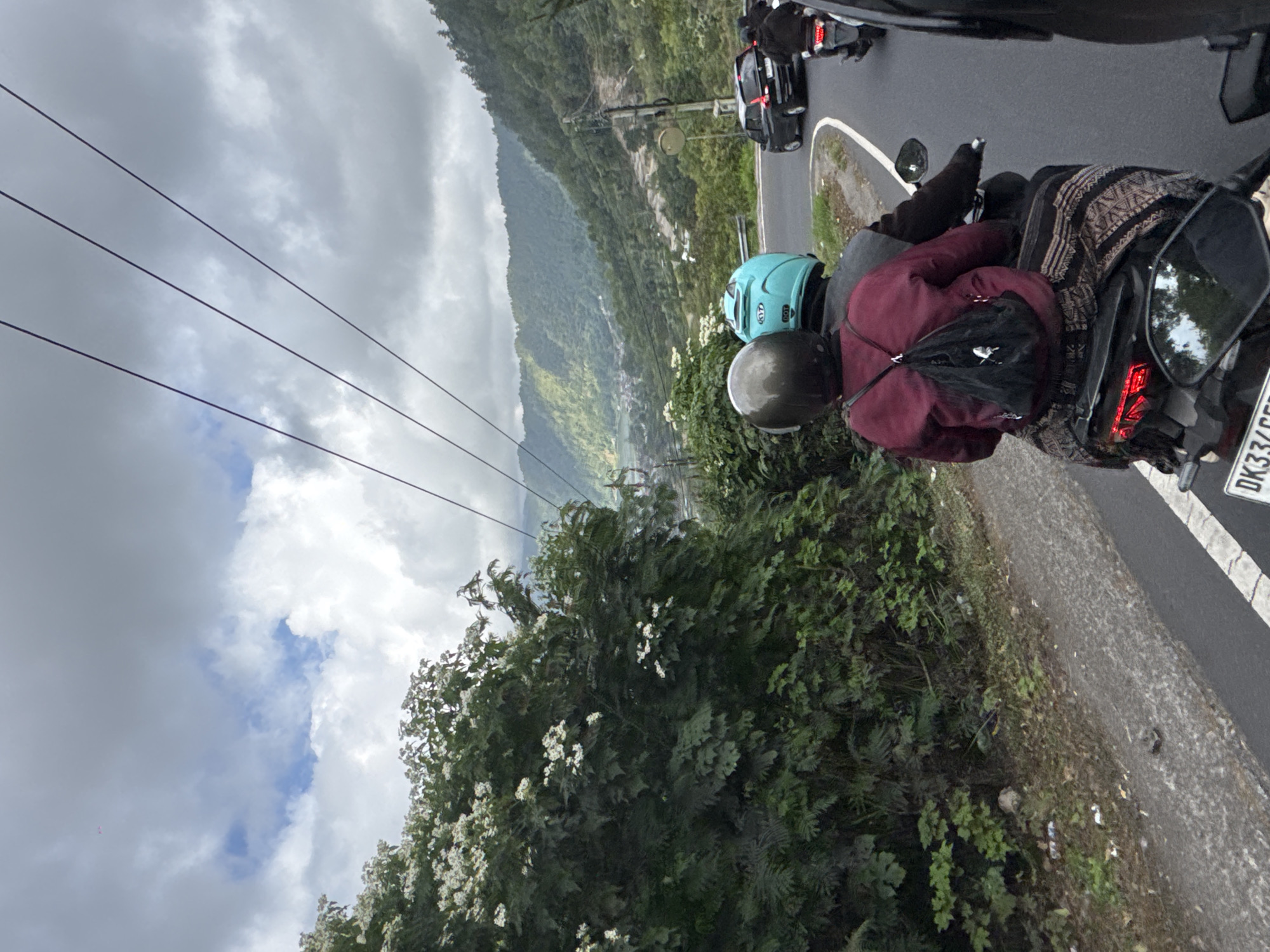 Motorbike run through Kintamani with Mount Batur in the clouds