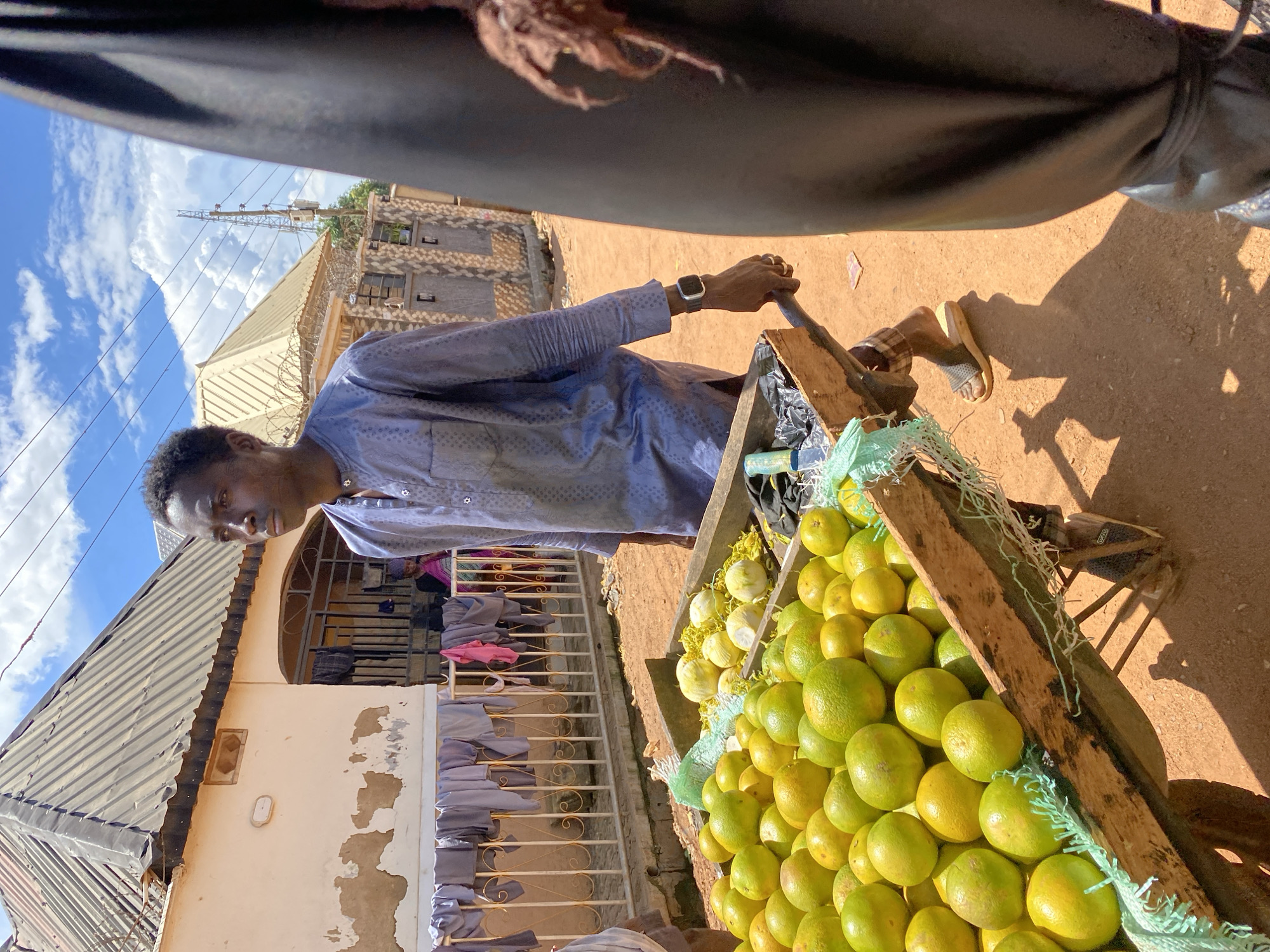 Everyday market life moving through the streets of Bukuru