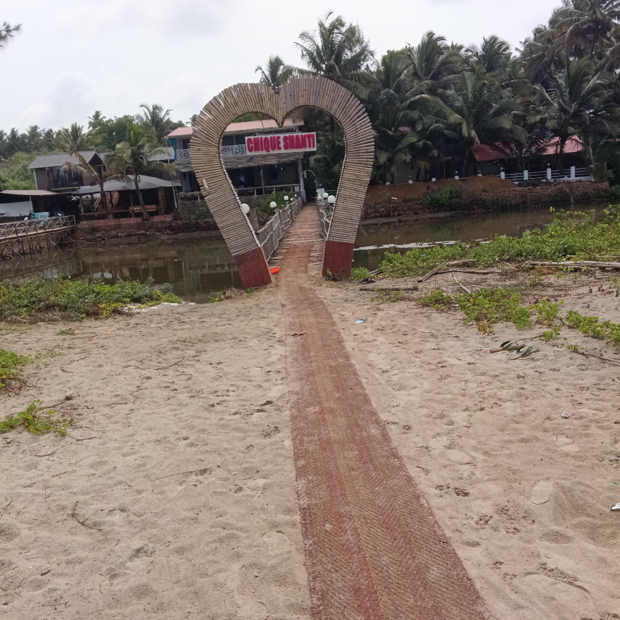 Mandrem Beach visitors document Chique Shanti's heart archway and facilities