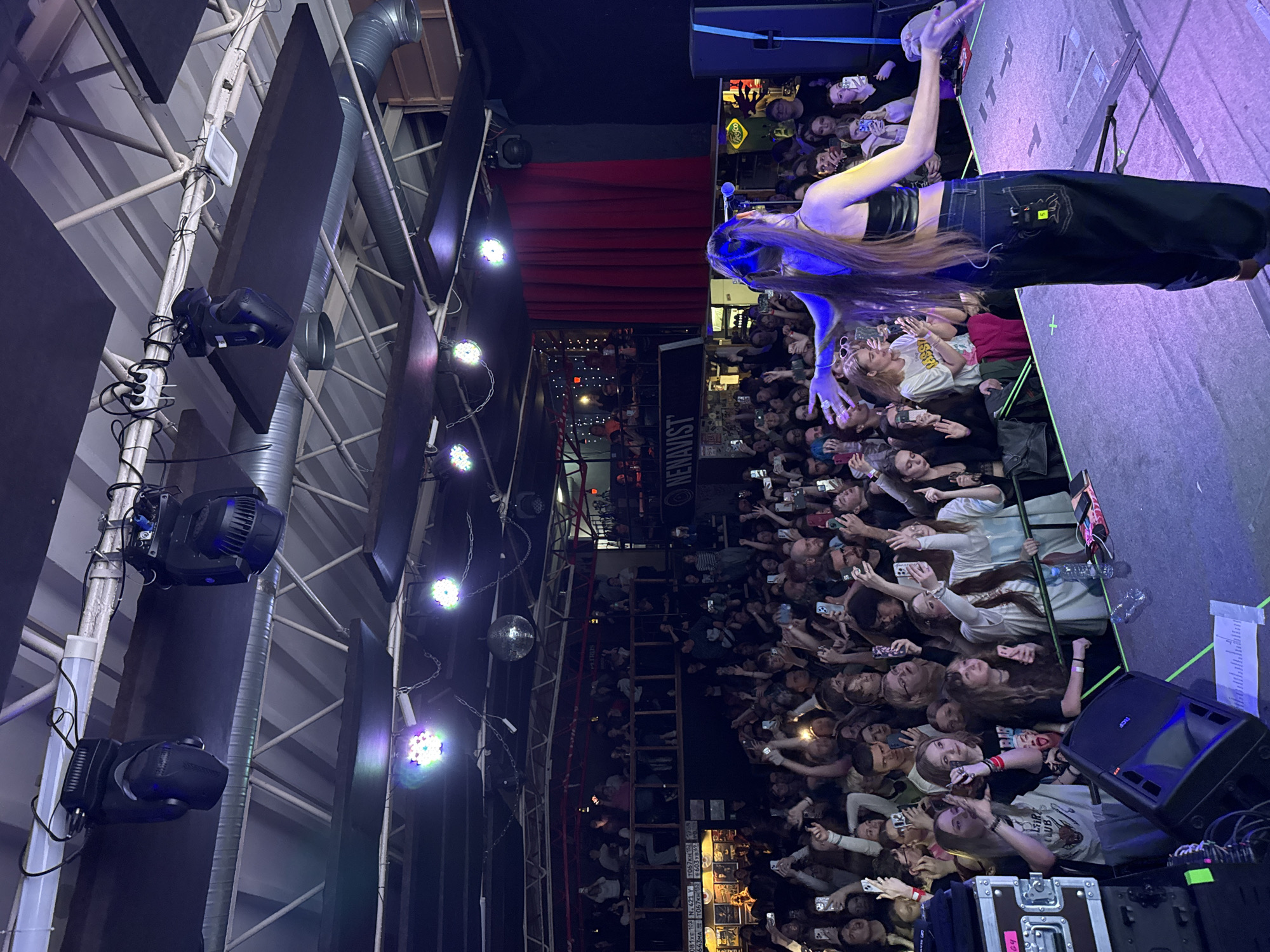 Female artist performs to large crowd at Nizhny Novgorod club