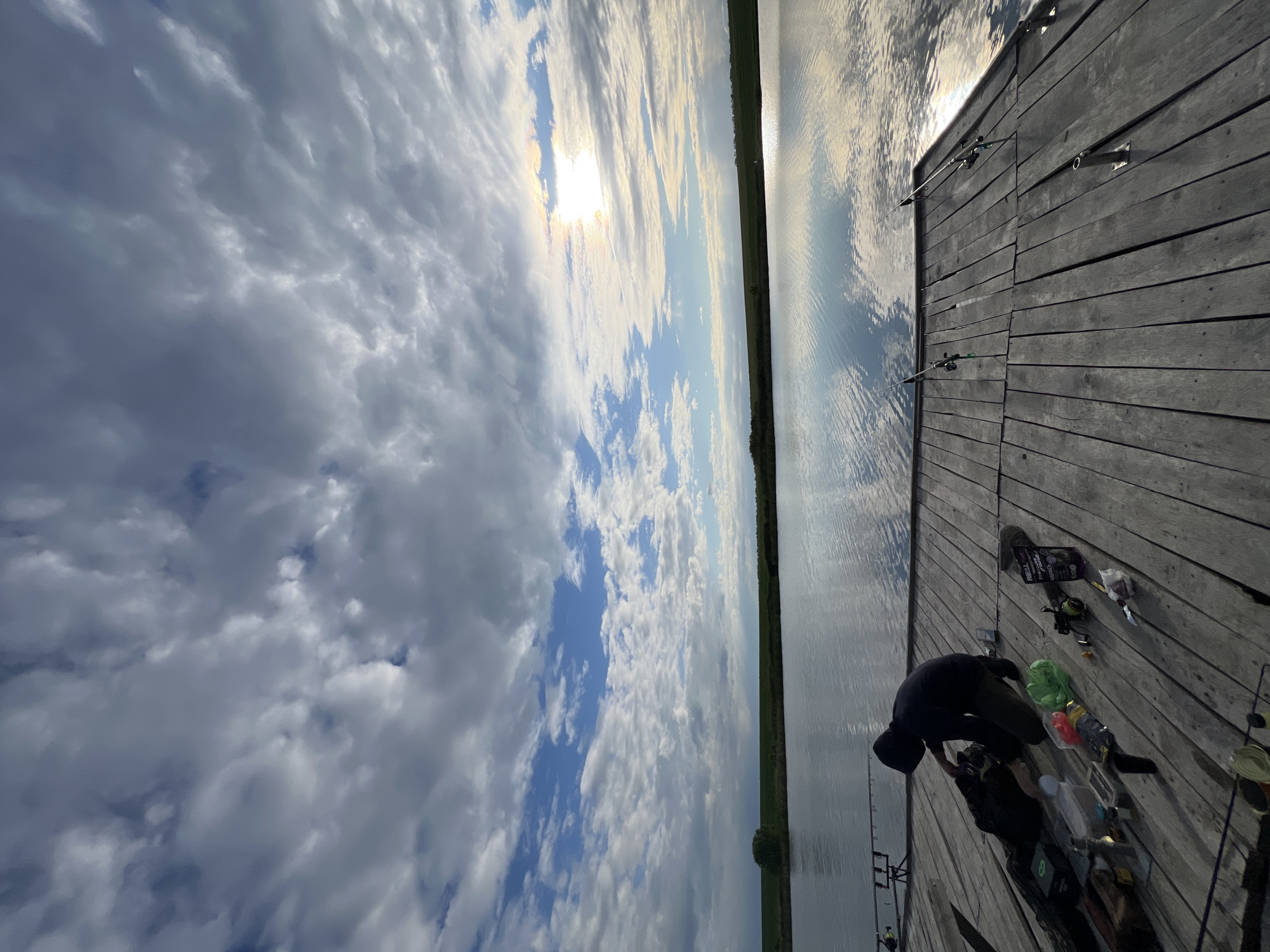 Early morning fishing session observed at Kopychyntsi lake dock