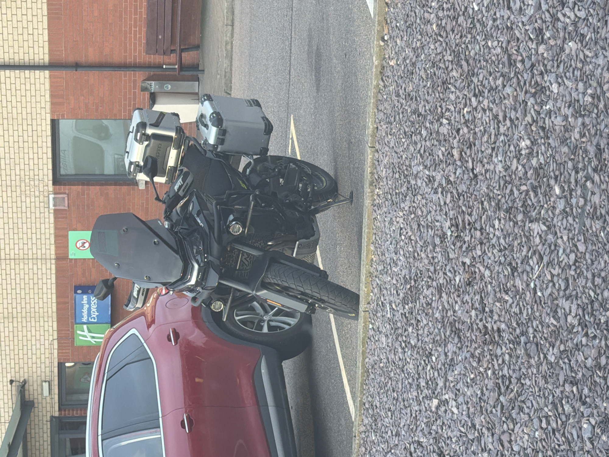 Motorcycle parked near Holiday Inn Express in Luton