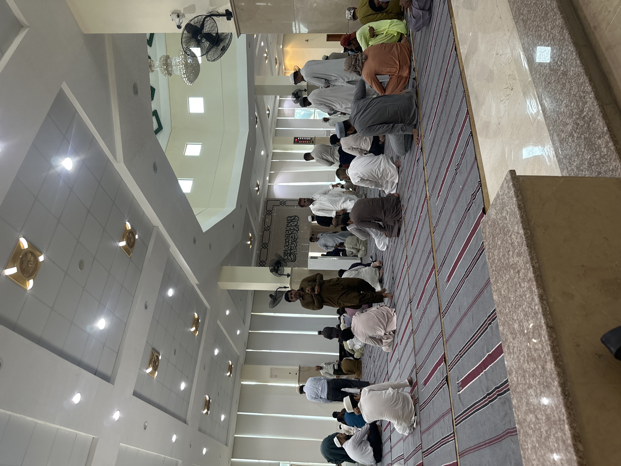 Congregational prayer underway inside a mosque