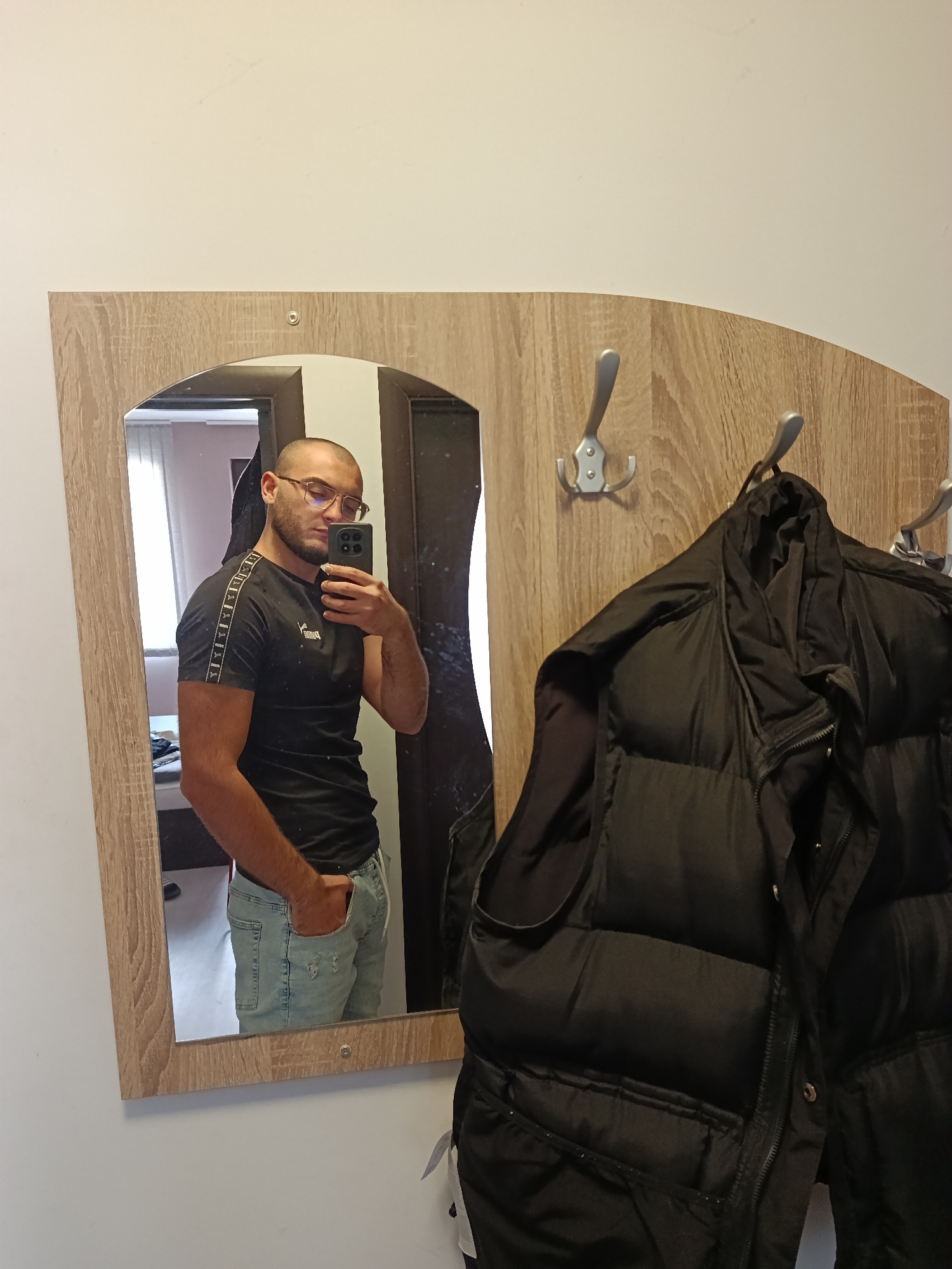Man takes mirror selfie in Plovdiv entryway
