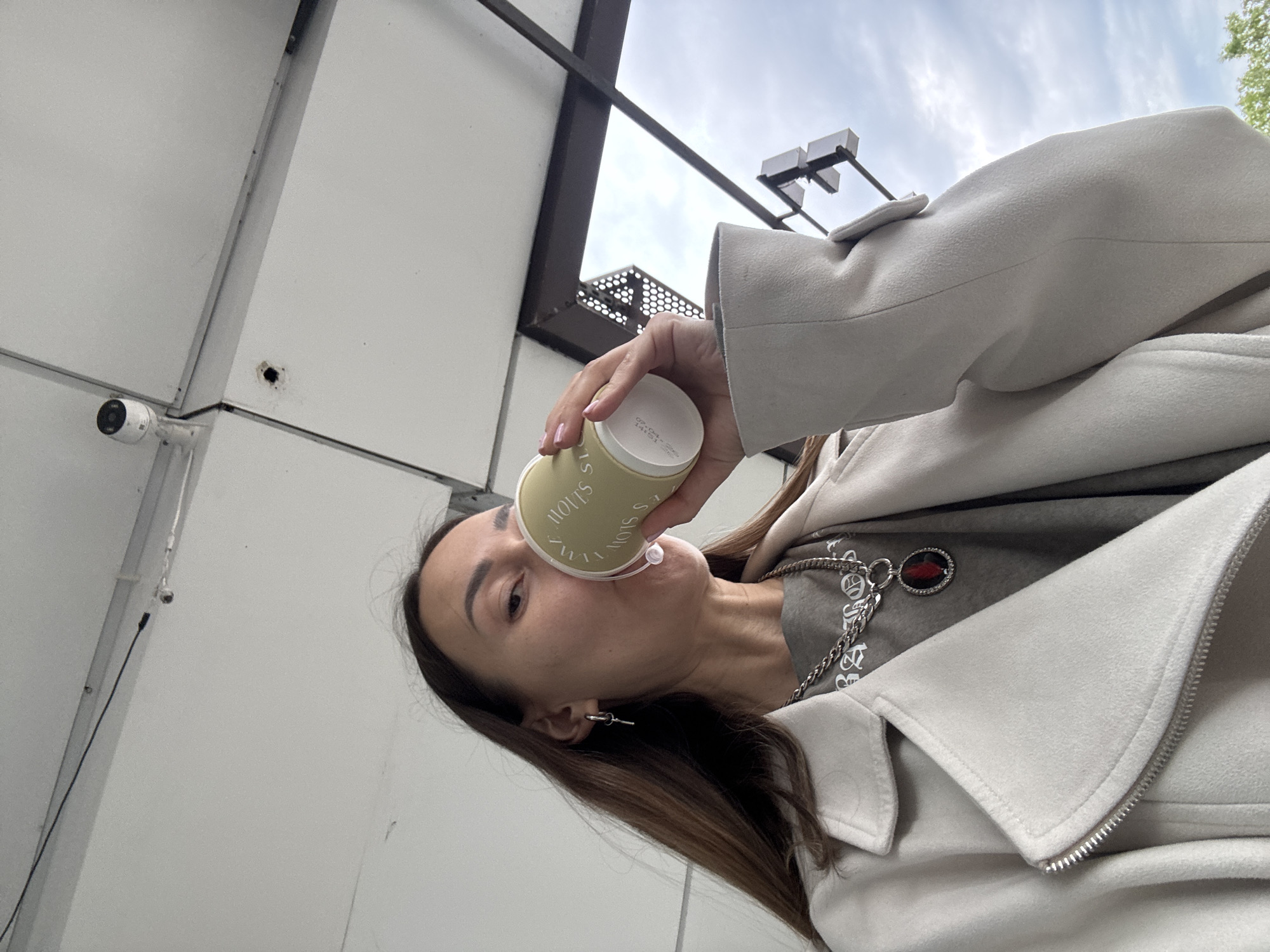 Woman documents coffee shop visit in Sochi