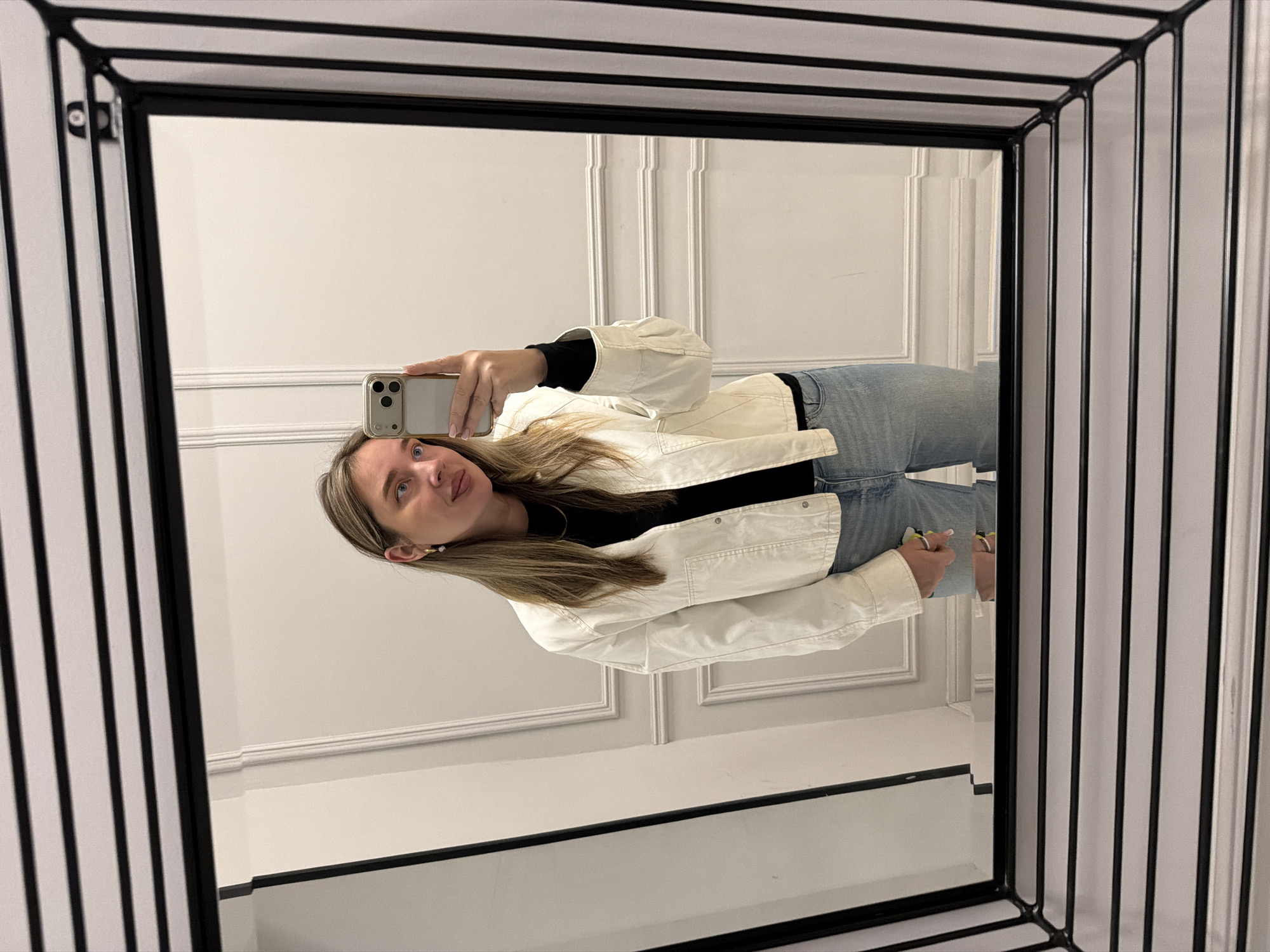 Woman takes selfies in Moscow urban setting