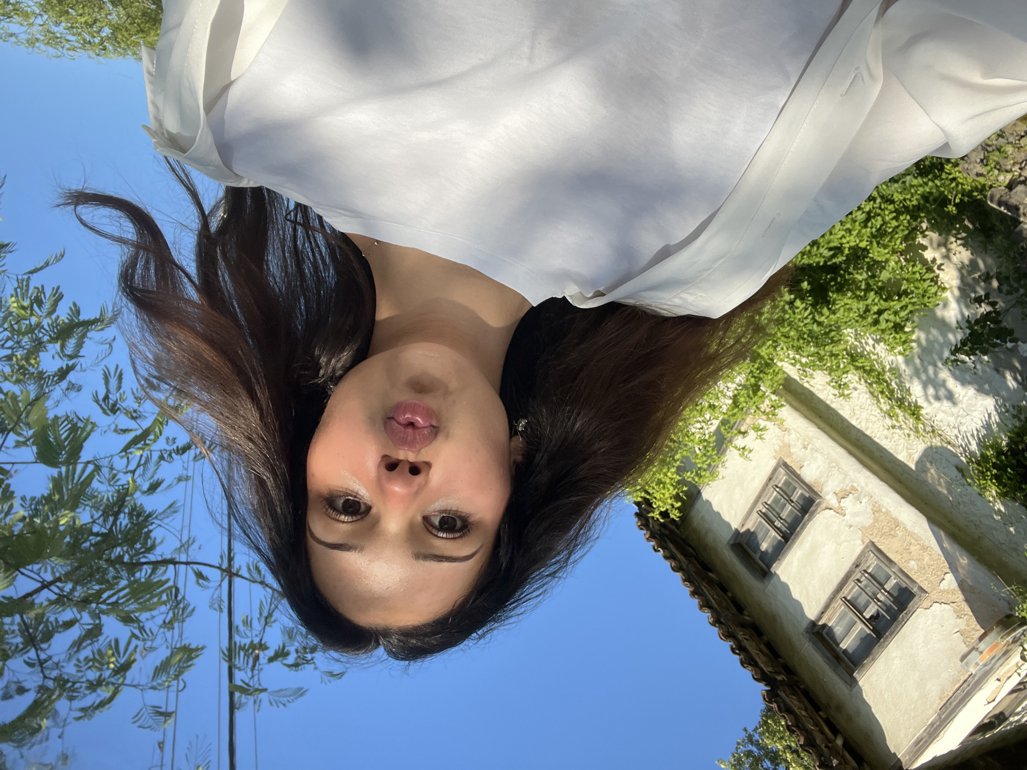 Woman documents morning selfie session in Zlatograd, Bulgaria