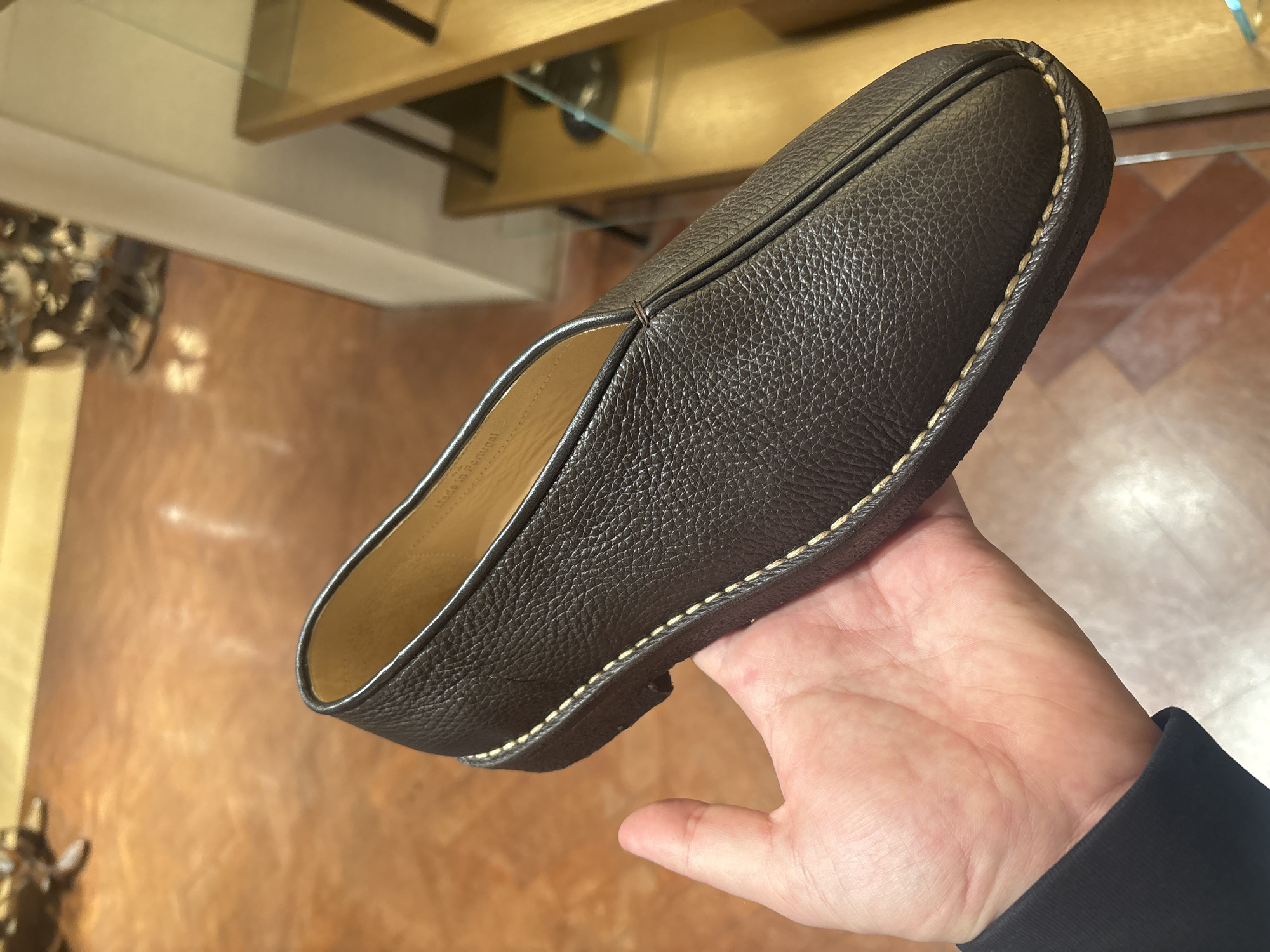 London resident displays leather slipper, Rick and Morty pickles