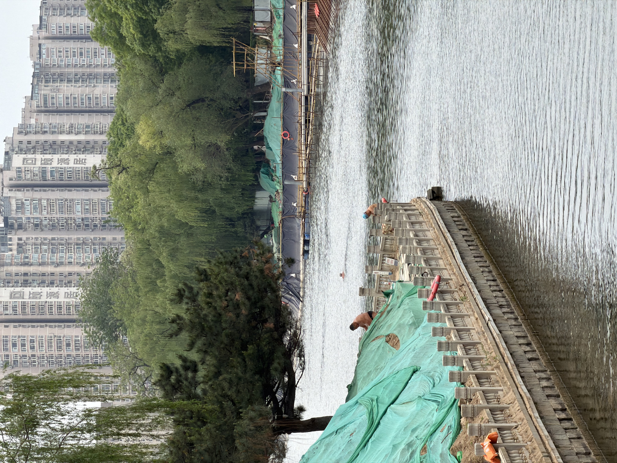 Construction activity observed along waterway in Beijing's Haidian District