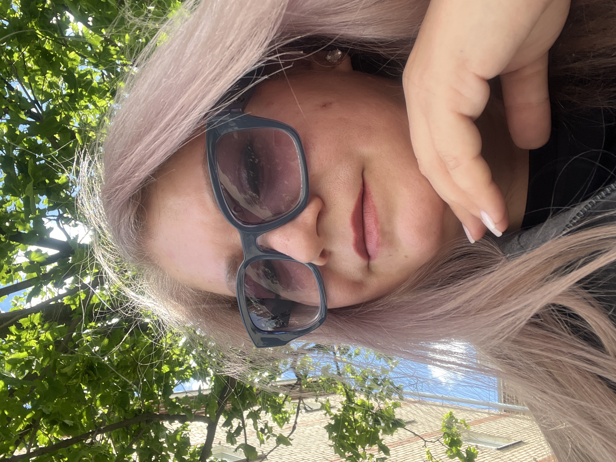 Woman takes selfies in Izhevsk during morning hours