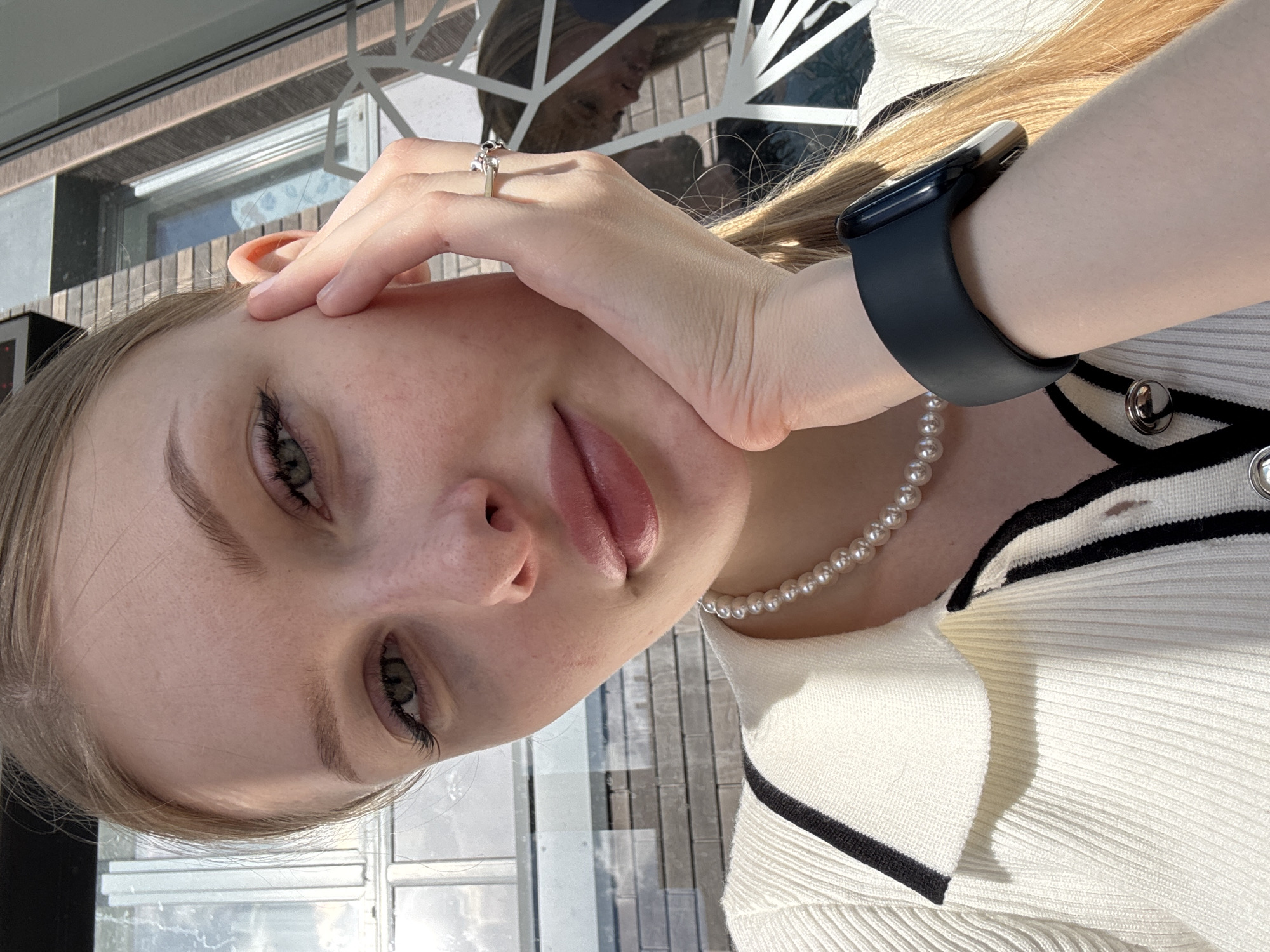 Woman documents shopping day with selfies in Perm, Russia