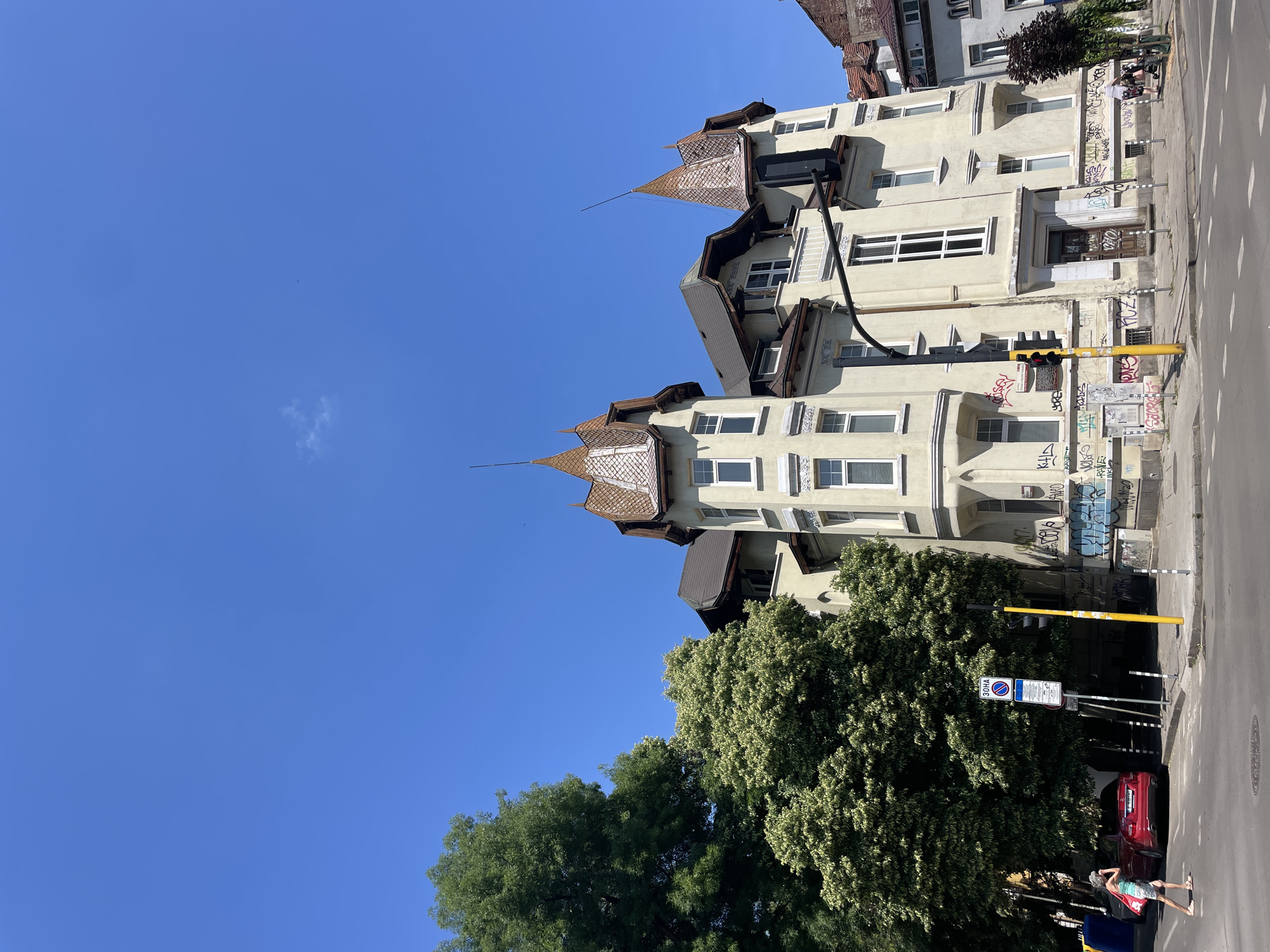 Sofia street scenes: historic towers, café terrace, modern curved facade