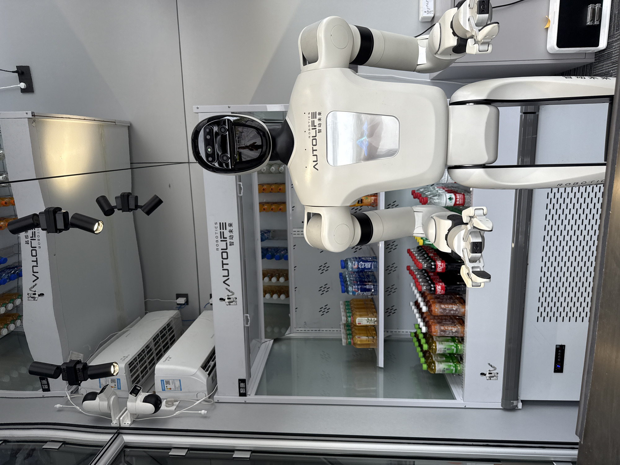 Robot serves beverages amid everyday street scenes in Haizhu District