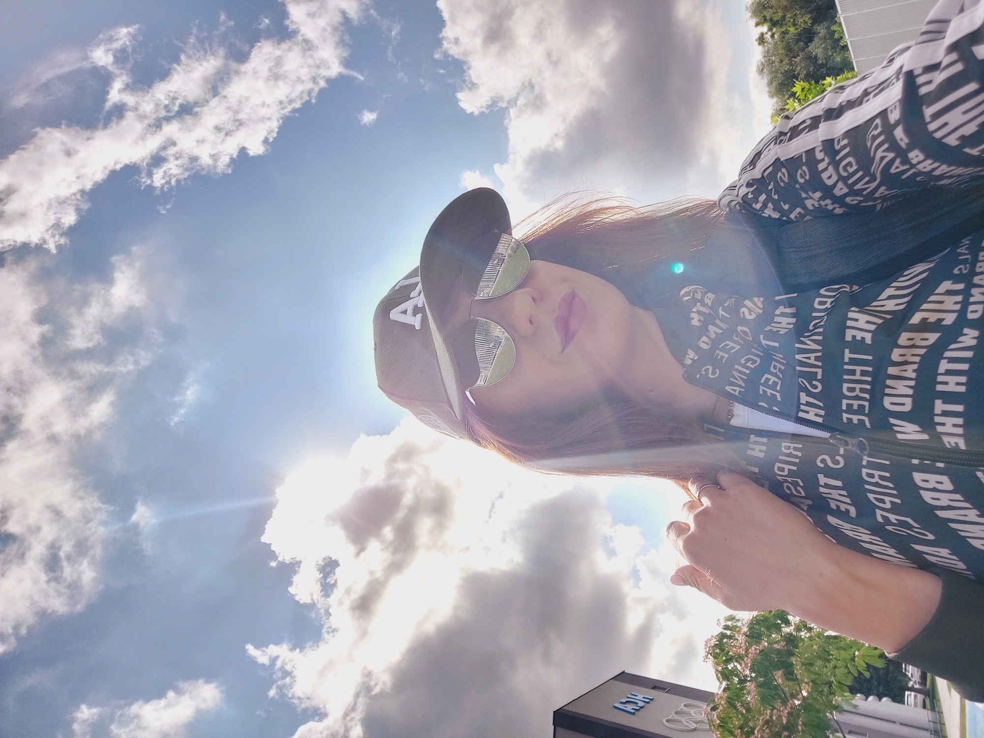 Morning selfies in Sofia, caps and mirrored shades.