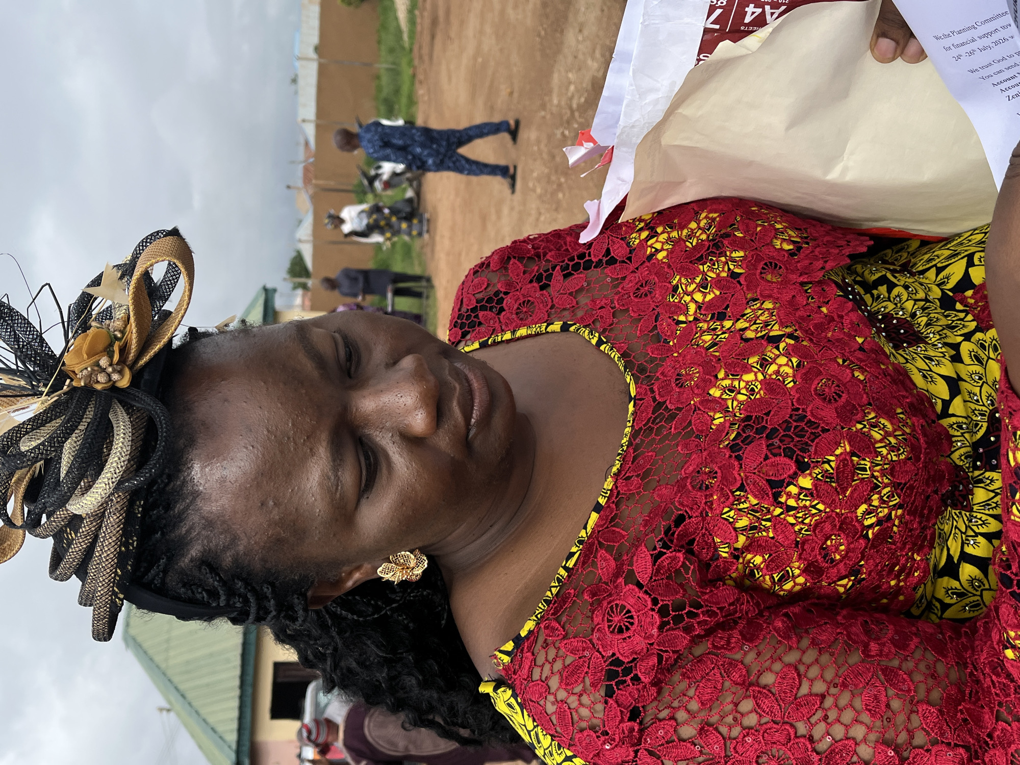 Religious community gathering in Jos, Nigeria, dressed for the occasion