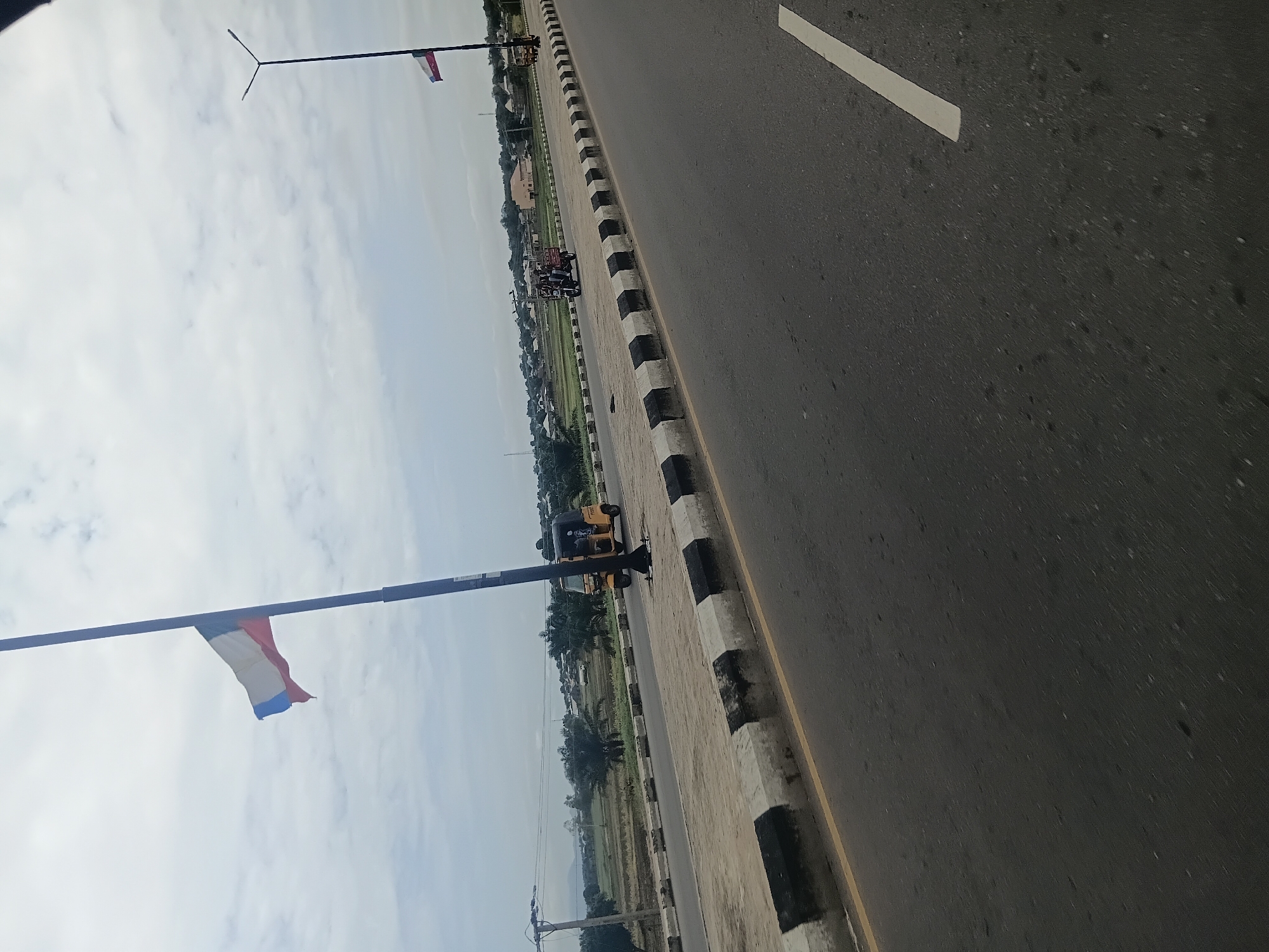 Jalingo streets, river crossings, and daily transport on a cloudy morning