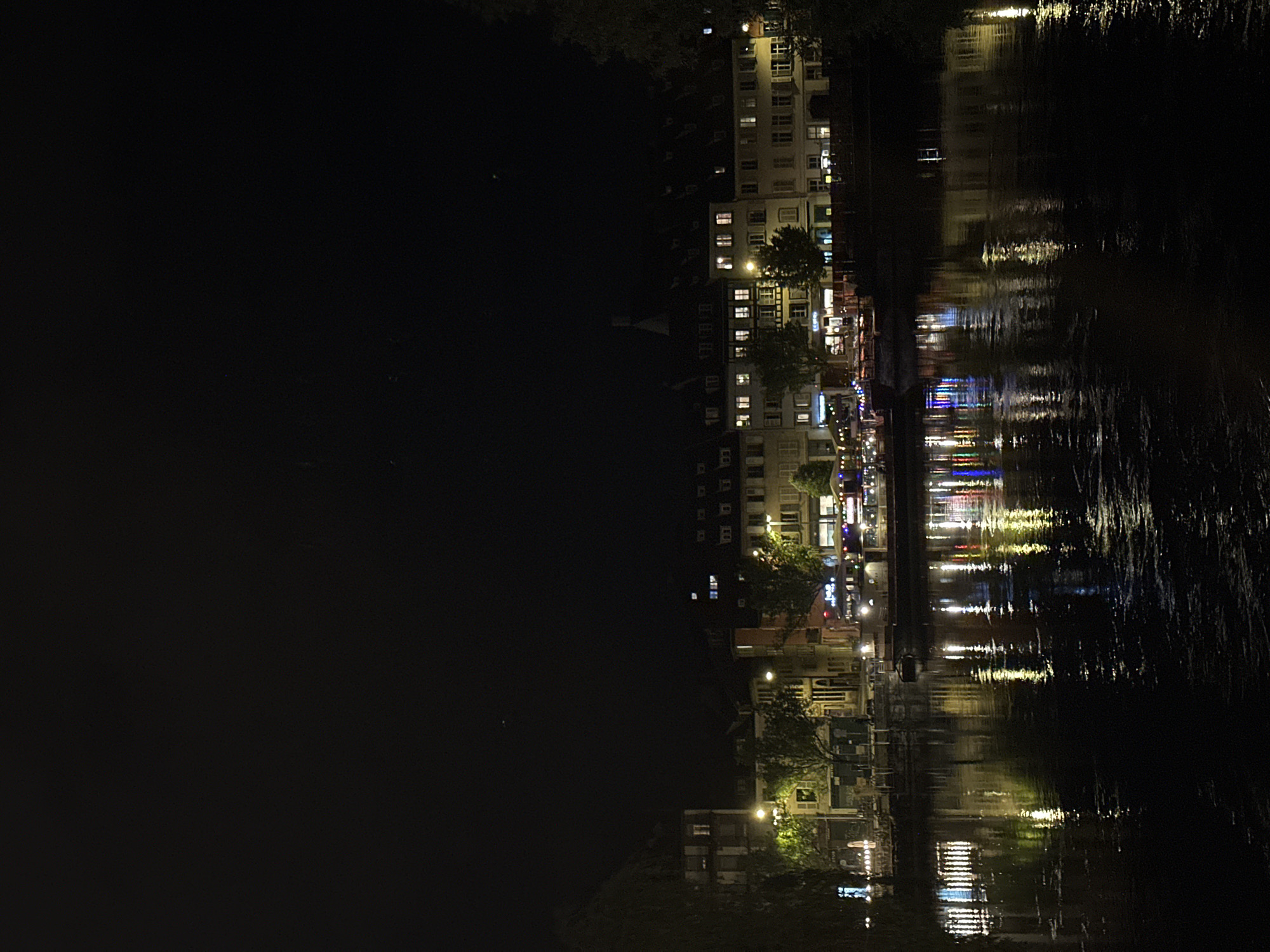 Evening stroll documented along Strasbourg's illuminated canals
