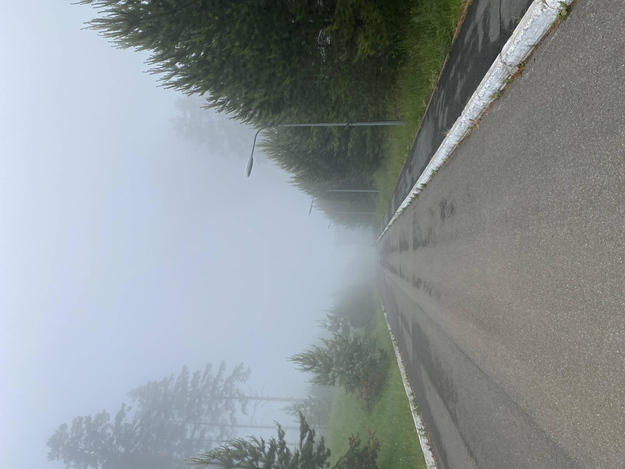 Dense fog blankets roads in Прикамский, Russia early morning