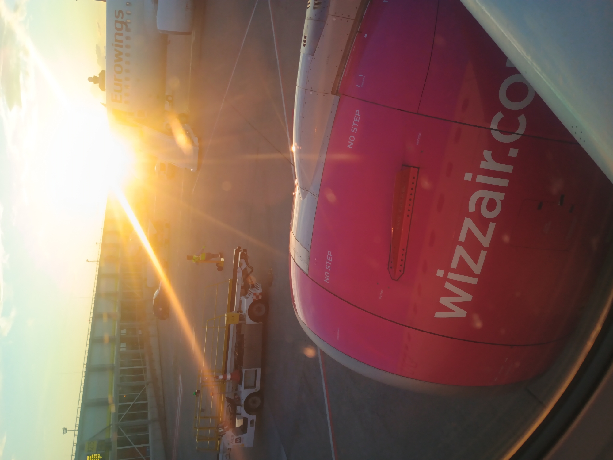 On the tarmac at Budapest airport, Wizz Air at sunset