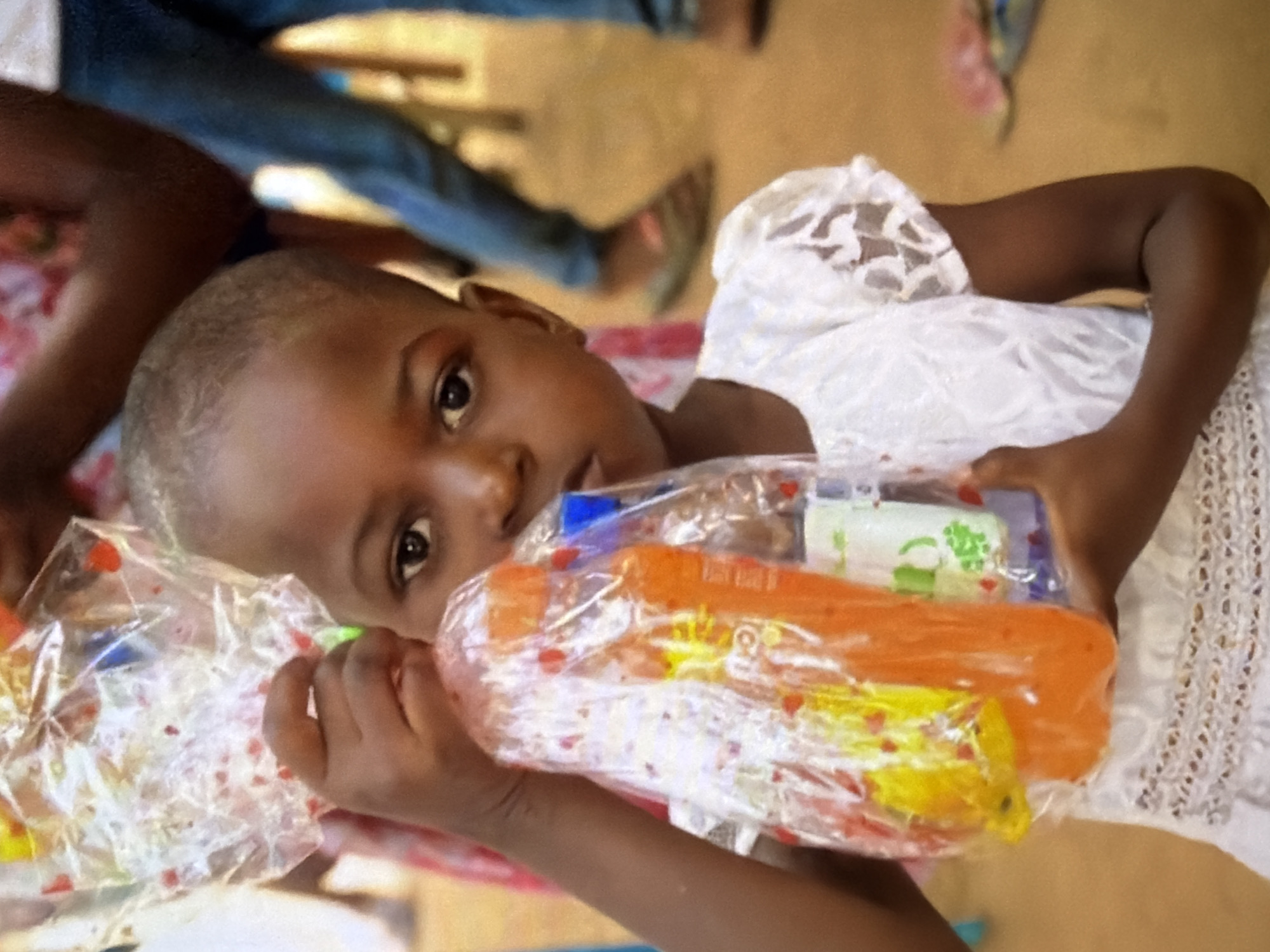 Food distribution and gathering at a children's orphanage