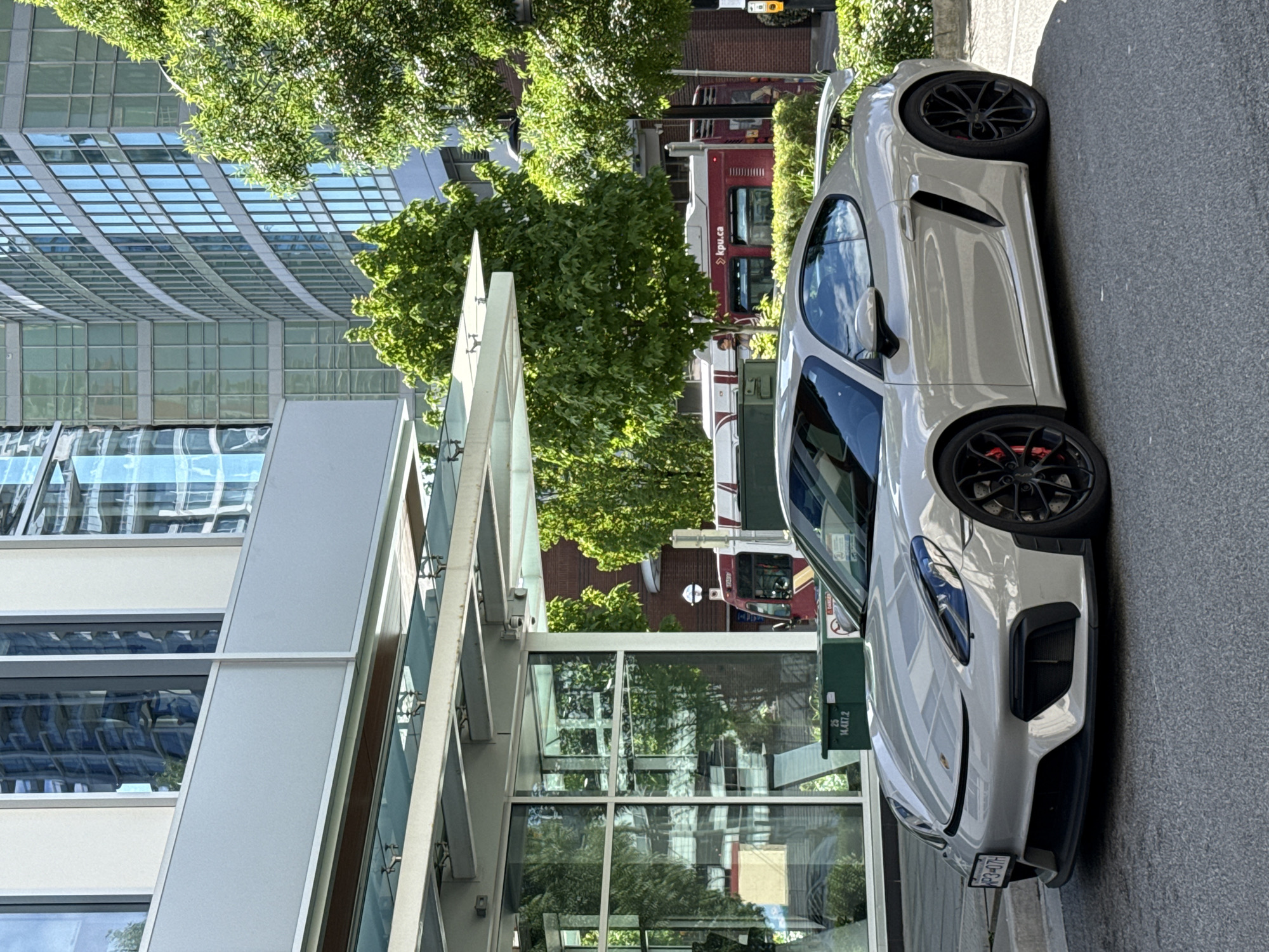 Porsche spotted parked on Burnaby street near modern building