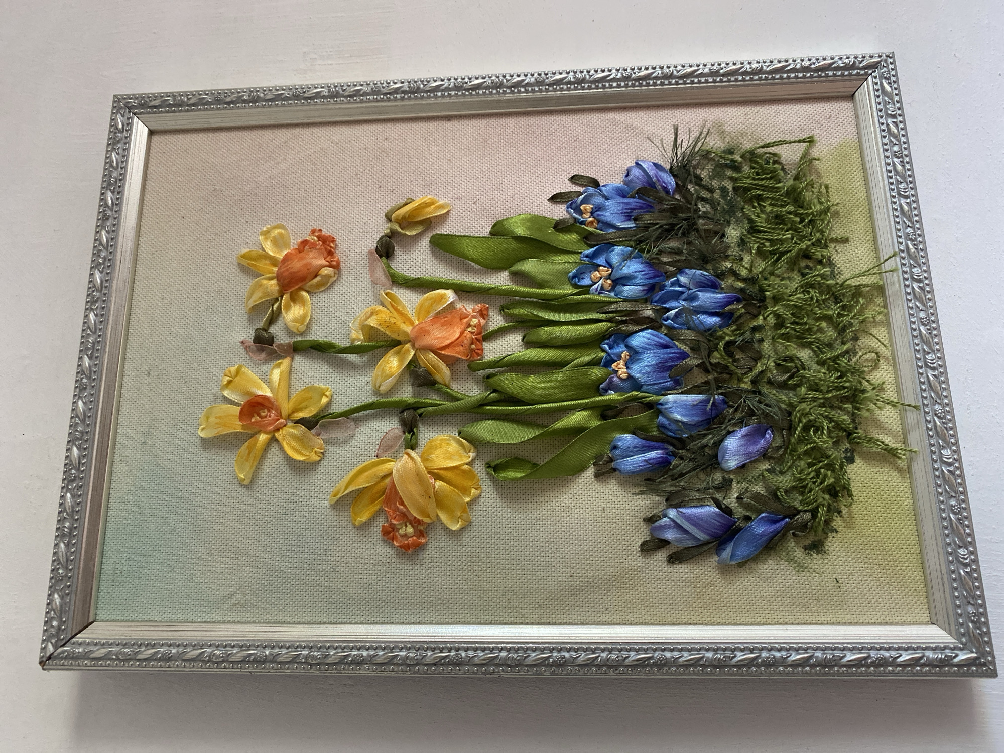 Handcrafted objects and florals arranged in Zelenodolsk still-lifes