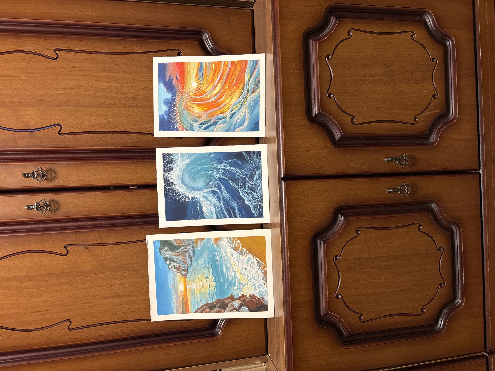 Amateur coastal painting displayed on easel in Izhevsk