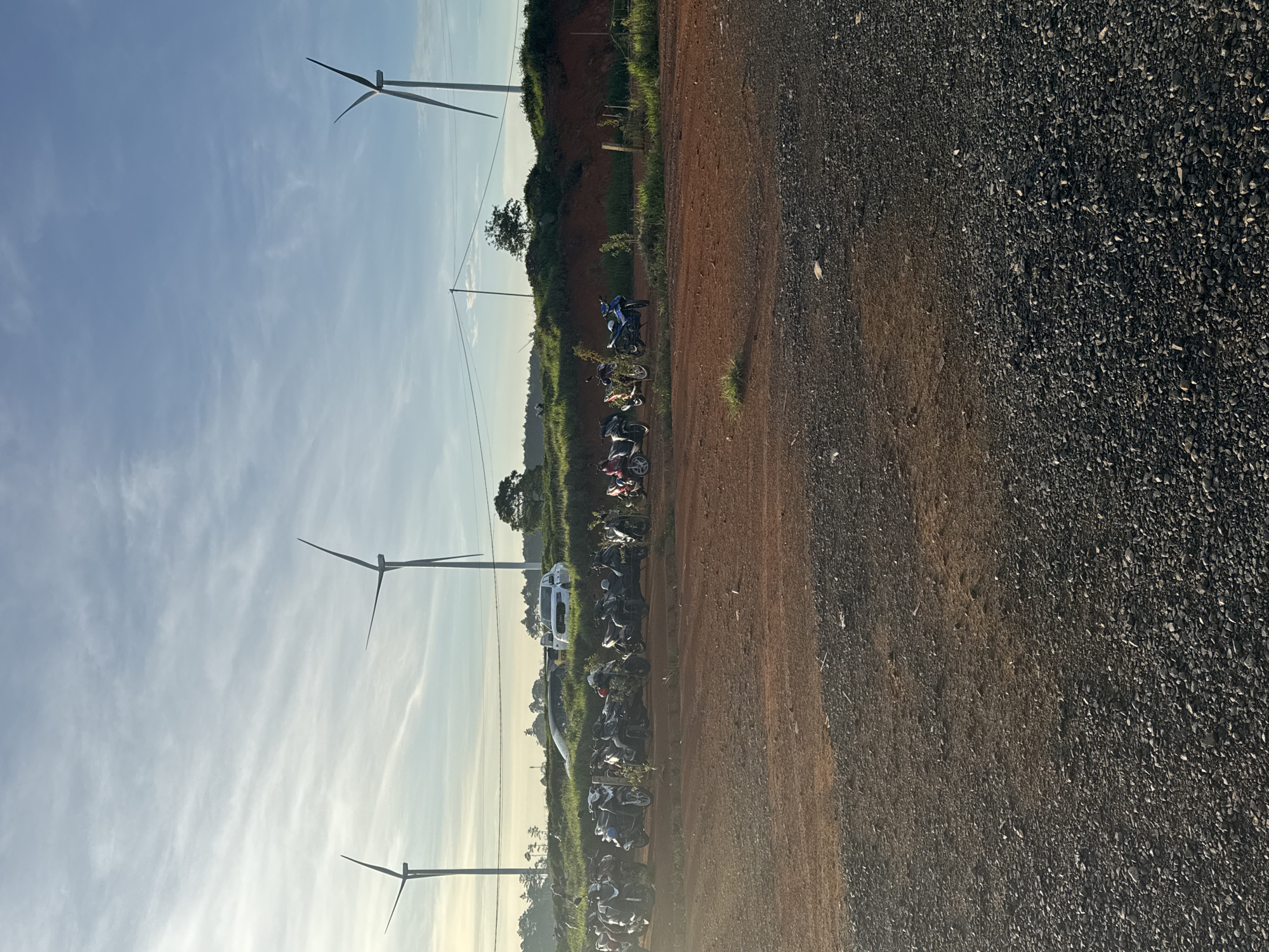 Evening visit to Phát Chi's wind turbines and tea-covered hills