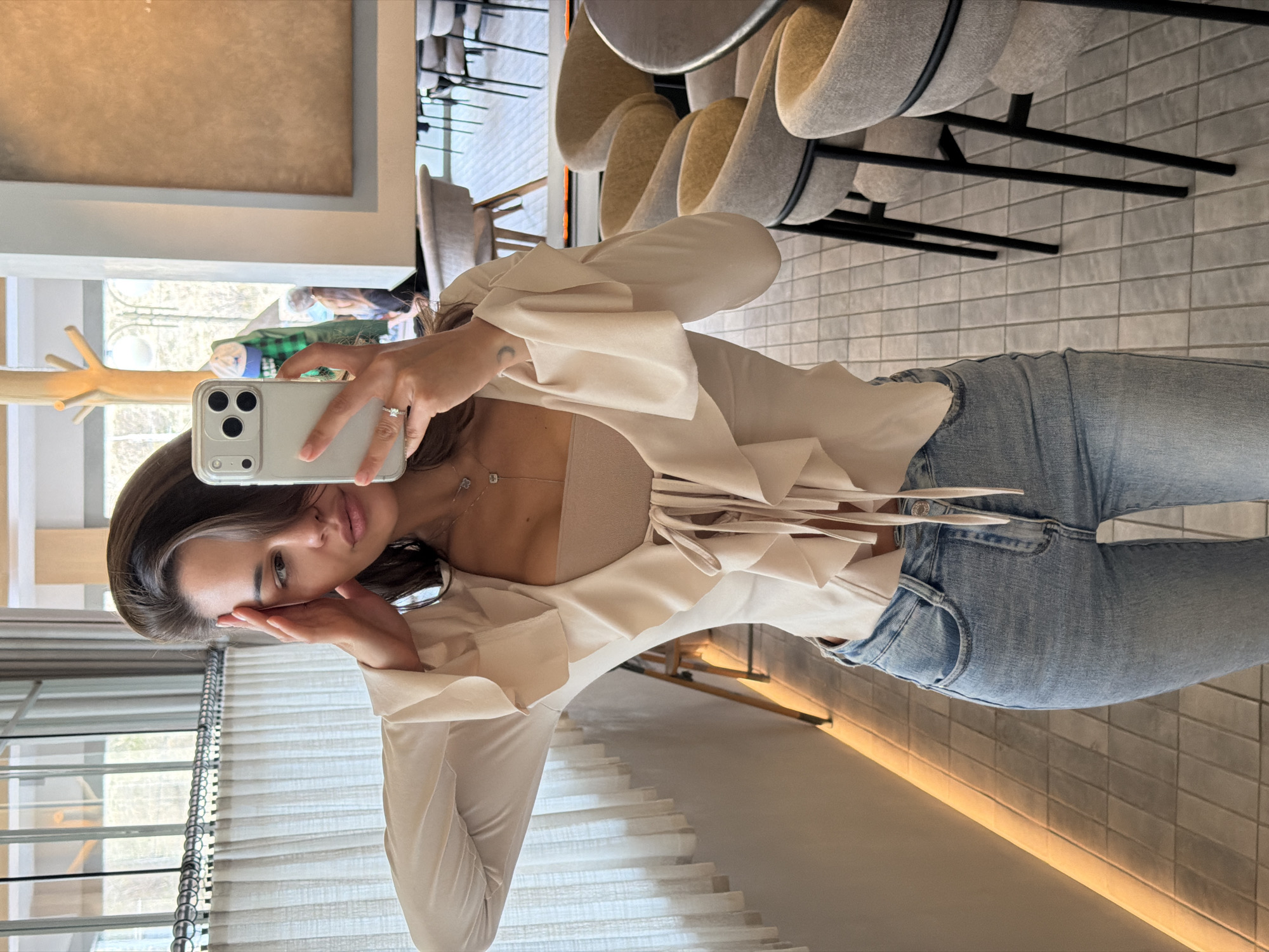 Woman dines, takes selfie at Krasnoyarsk cafe morning