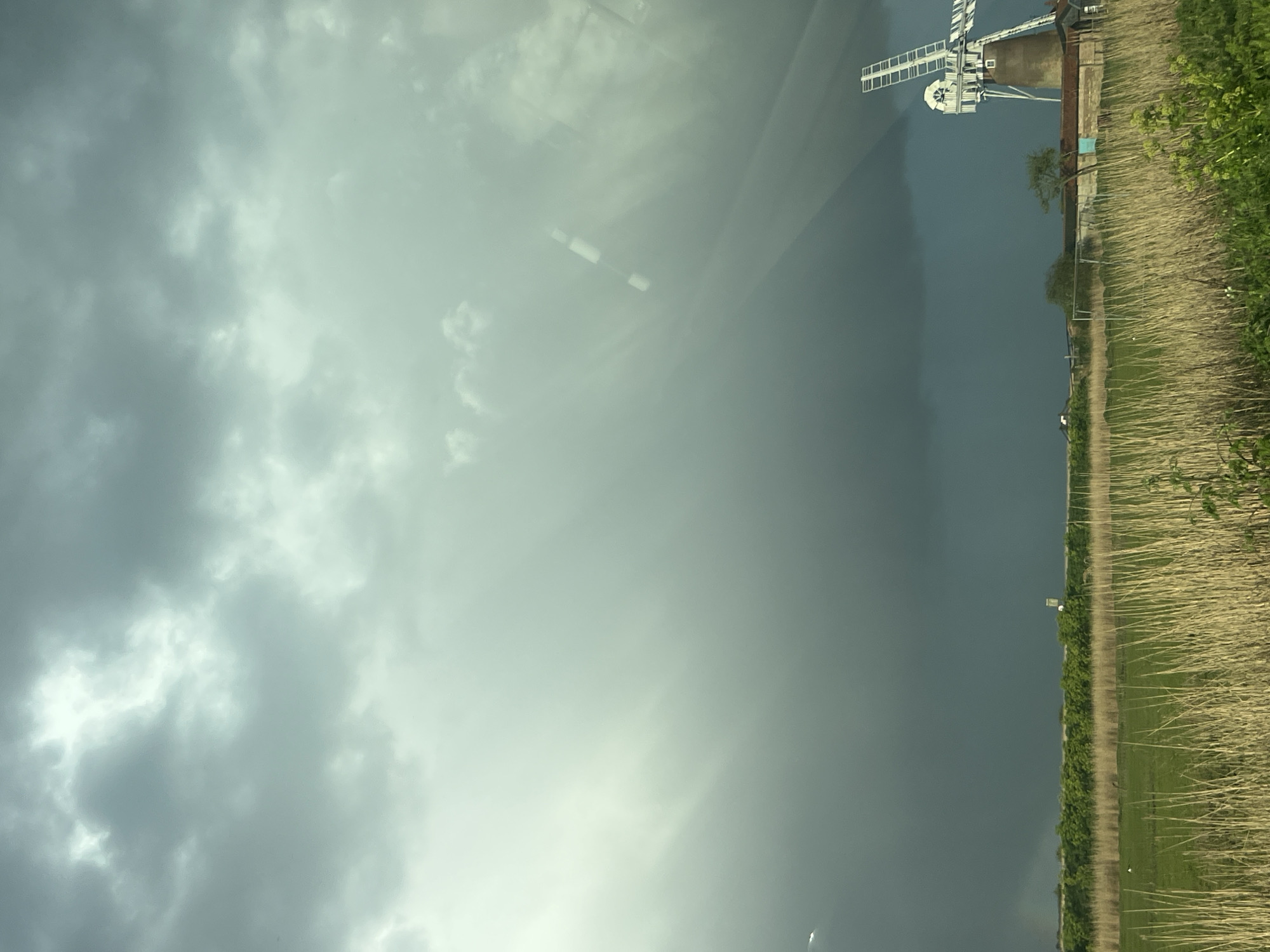 Windmill captured in overcast Broadland countryside scene
