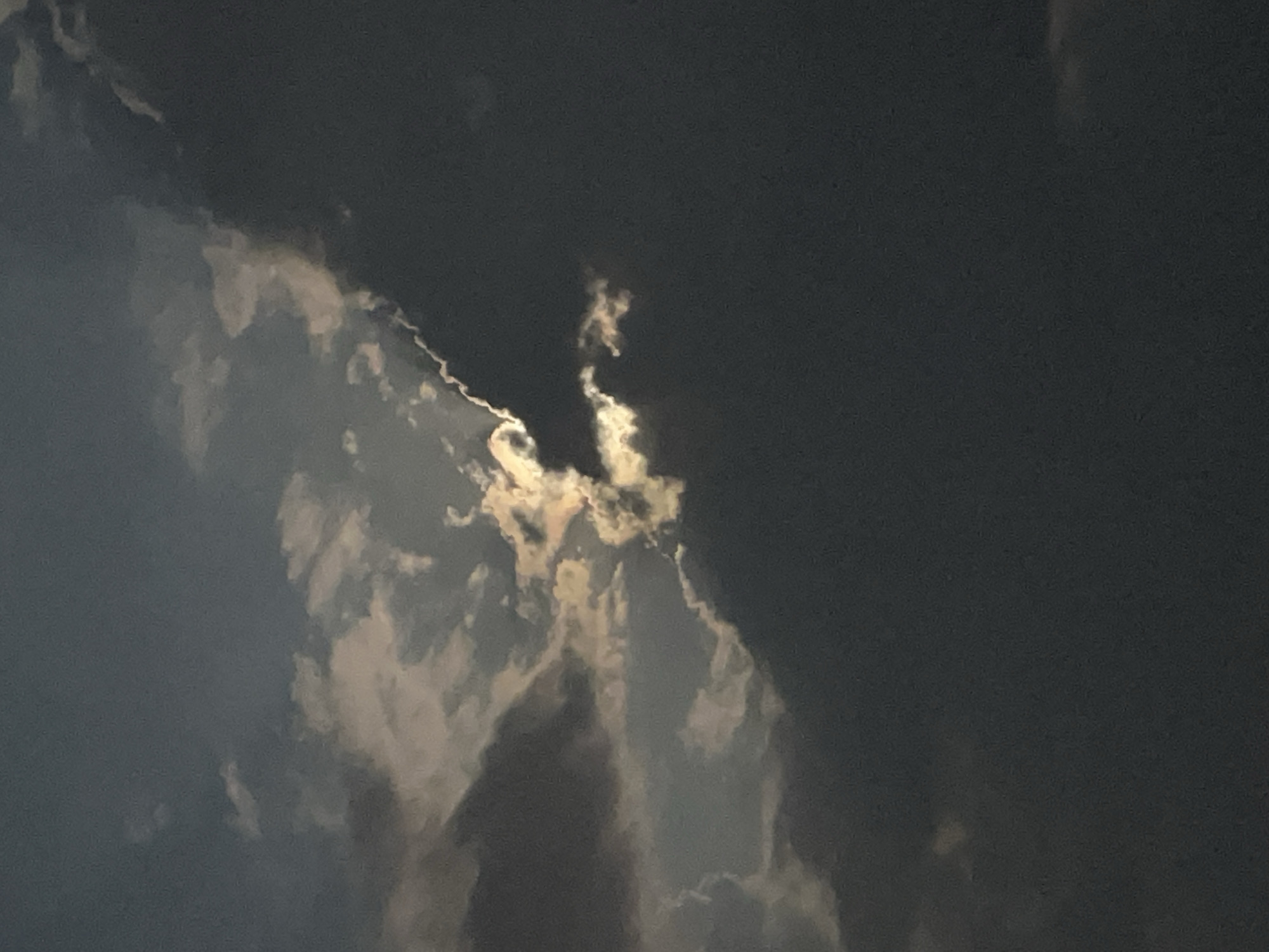 Moonlit clouds over the coast of Baošići at night