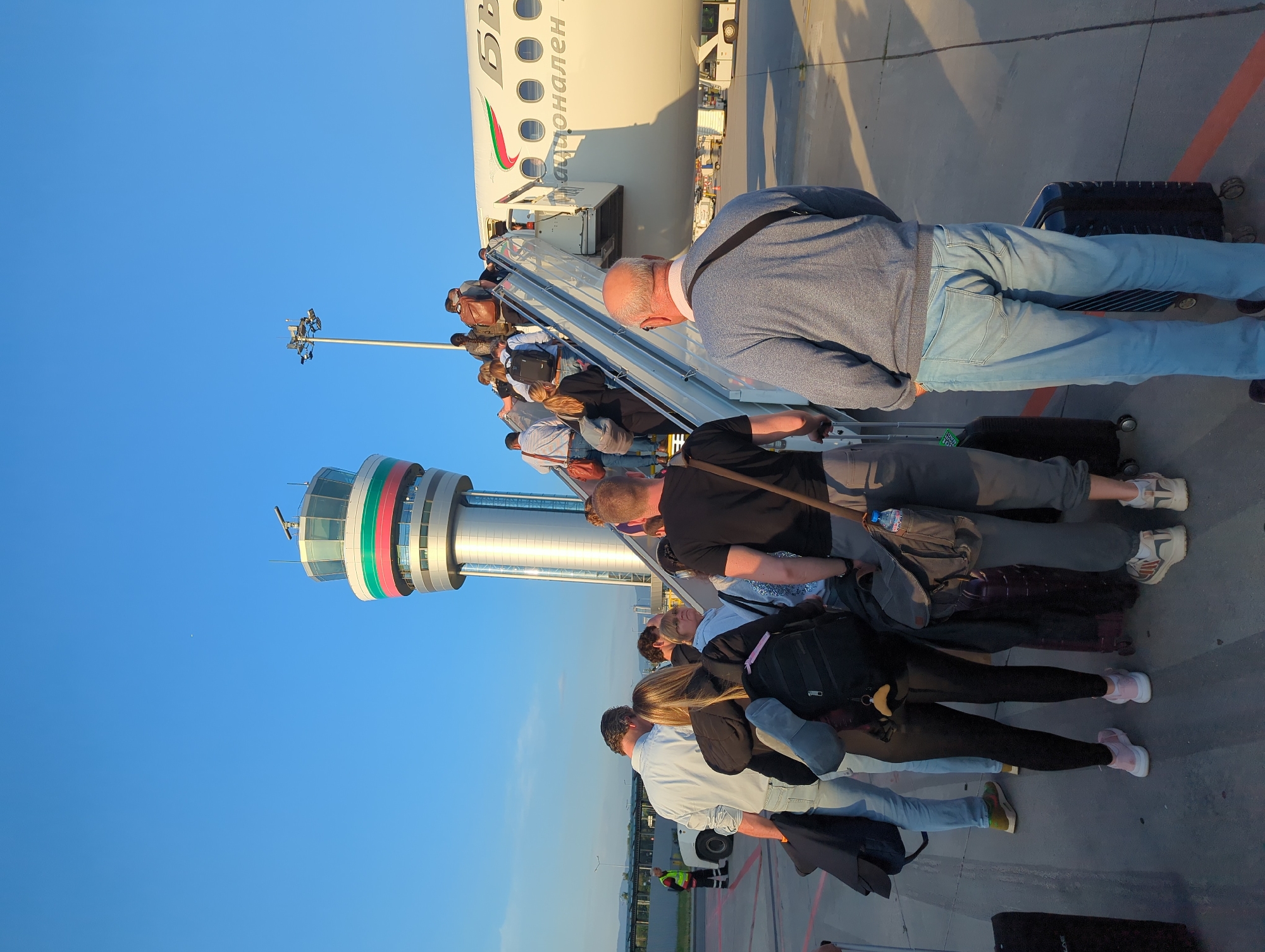 KC-135 tankers and civilian departures at Sofia Airport at dawn