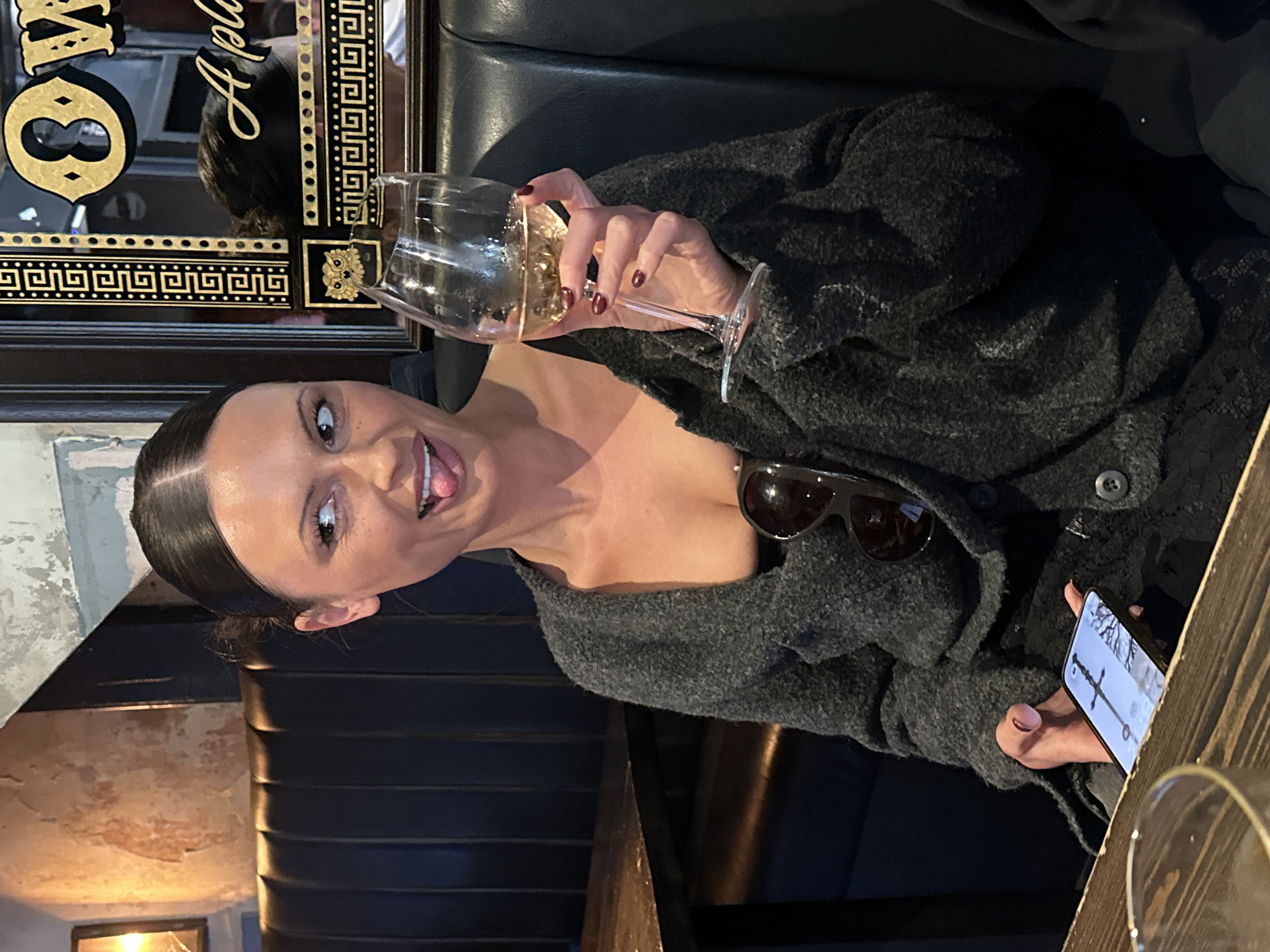 Woman photographed at Owl & Pussycat pub in London