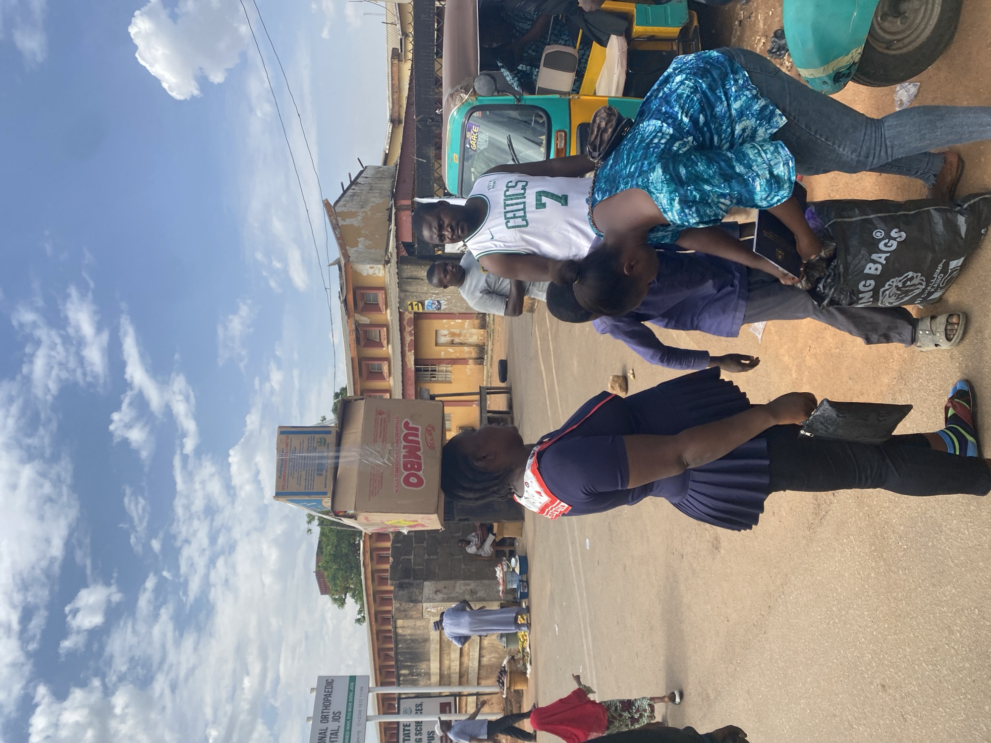 Daily street life documented in Jos, Nigeria commercial district
