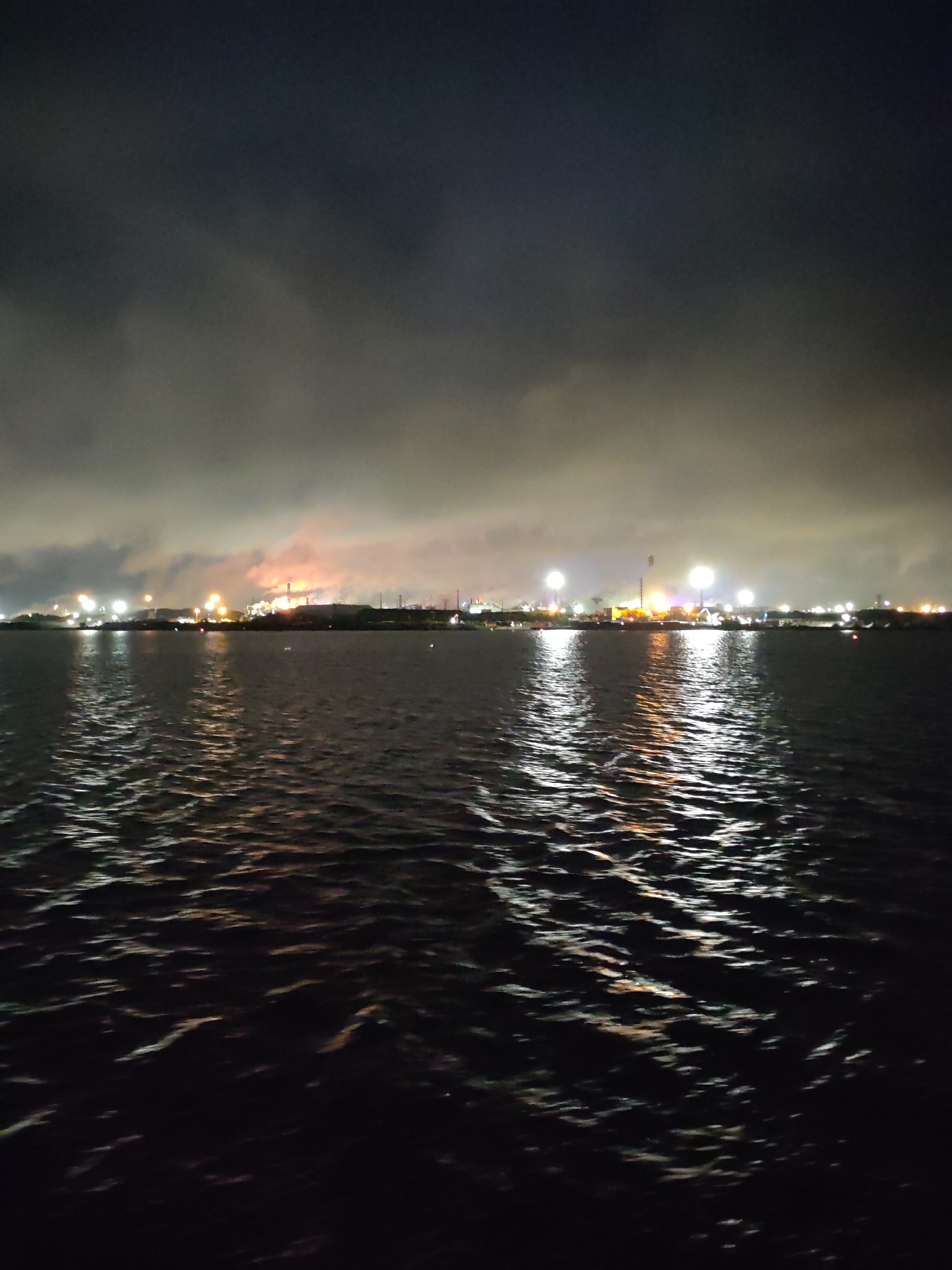 Nighttime river view captured in Cherepovets, Russia