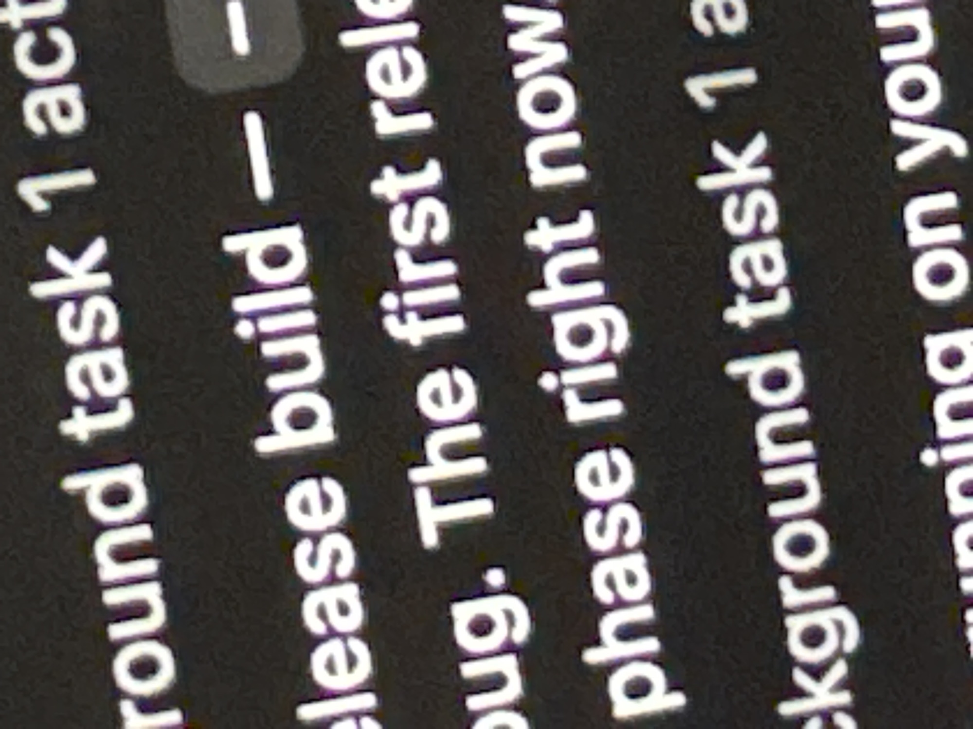 Fragmented software development text captured on screen in Erba