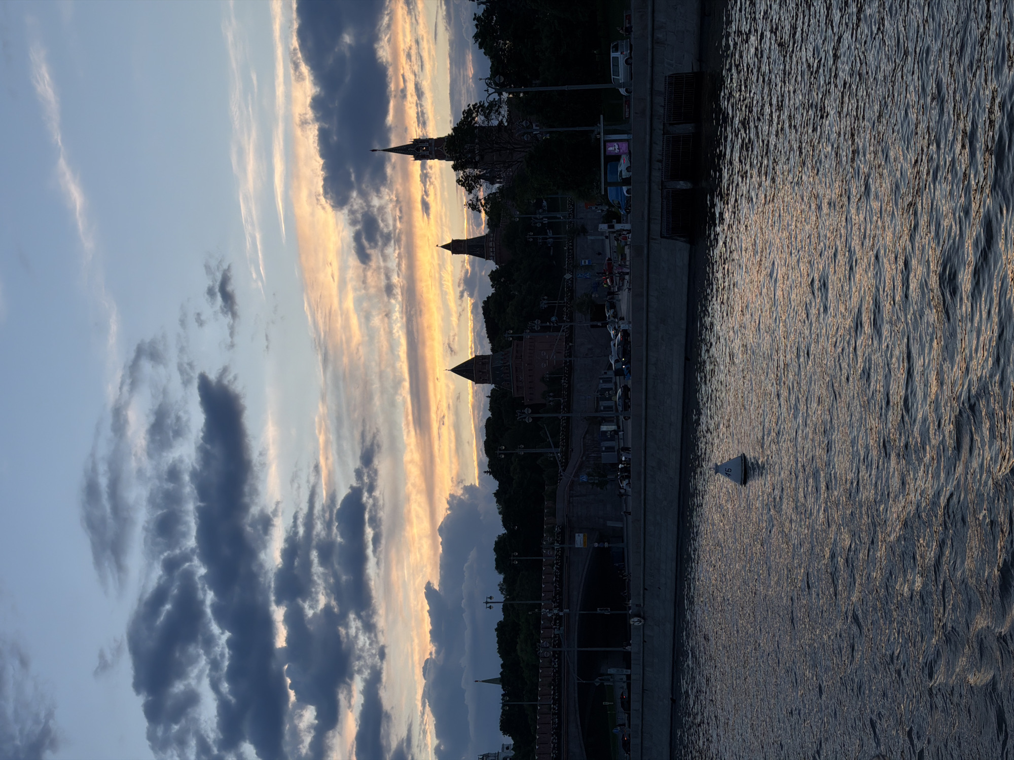 Golden sunset illuminates Moscow river at dusk