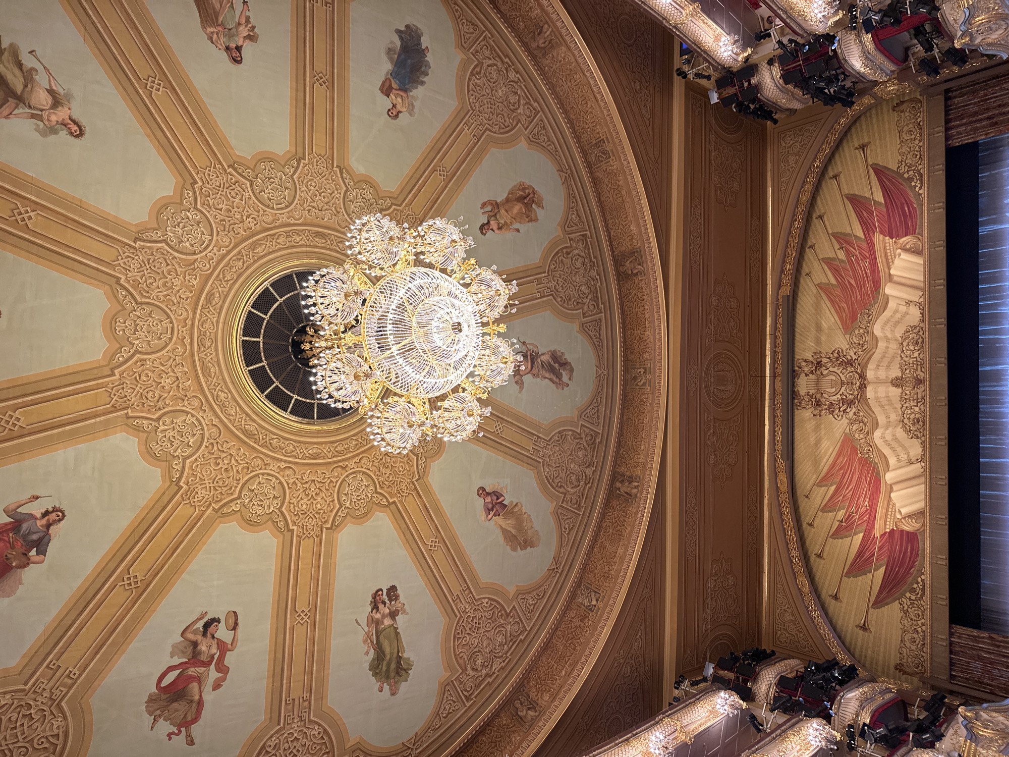 Moscow theatre's ornate ceiling and chandelier captured in photograph