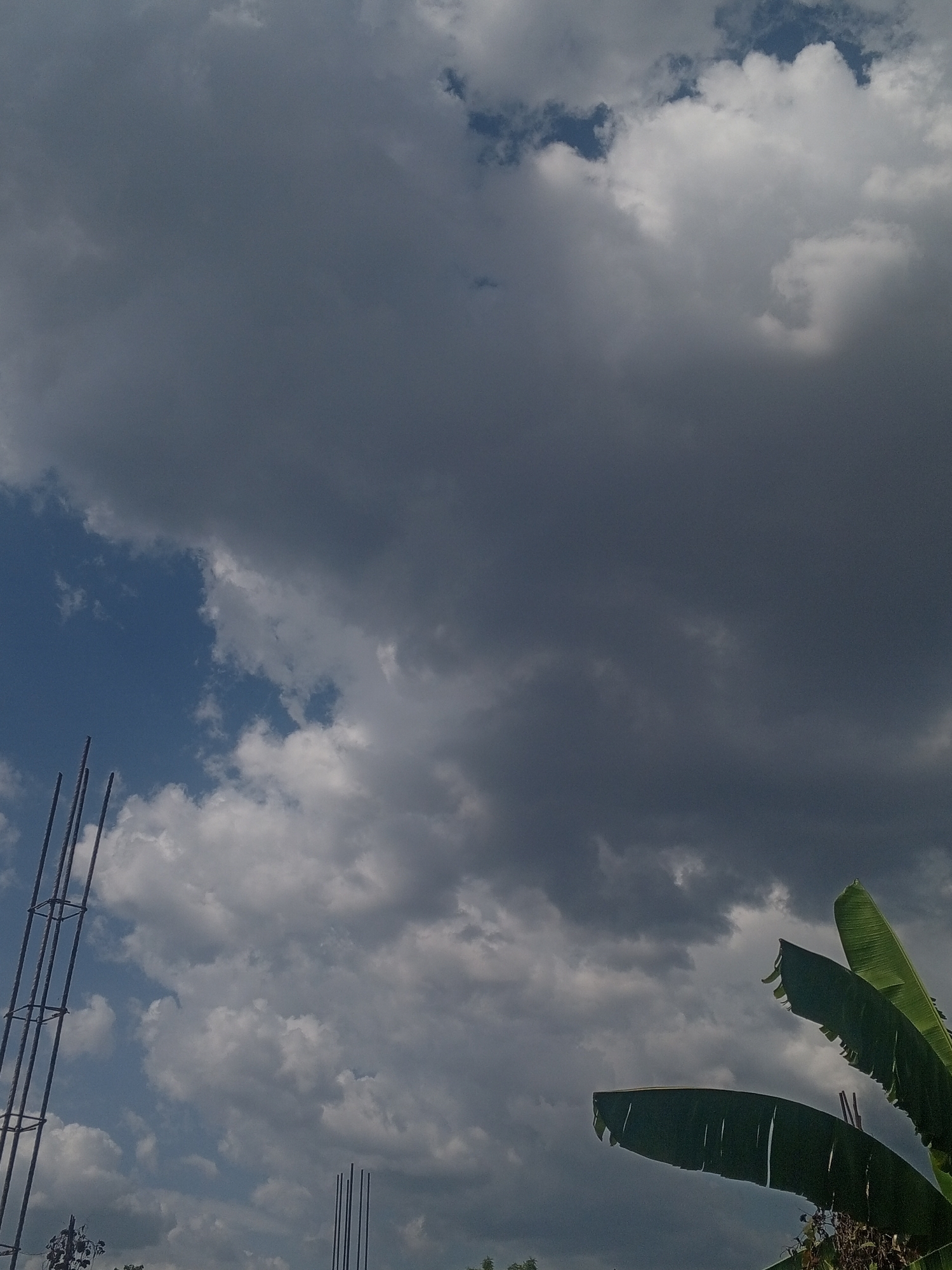 Storm clouds shift over residential Parroquia Ocumare, Venezuela