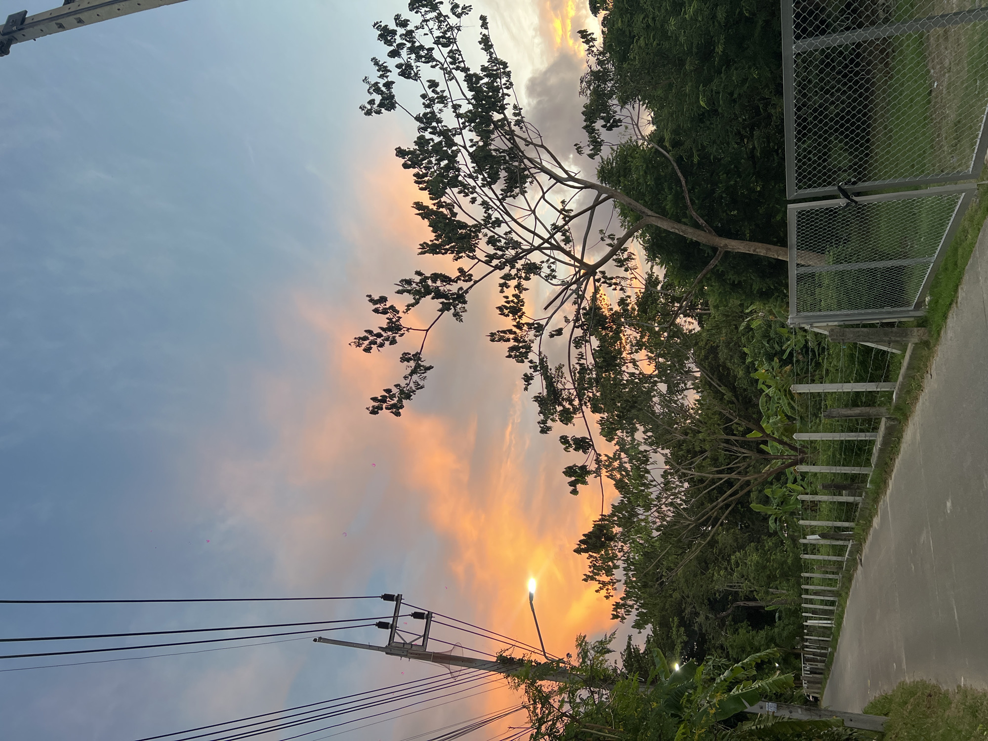 Golden hour on Chalong streets, dusk settling in